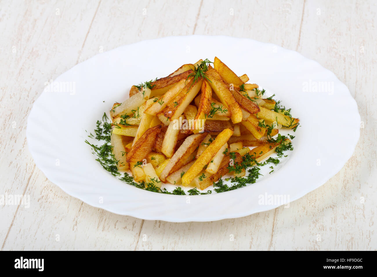 Roasted potato with dill and parsley Stock Photo Alamy