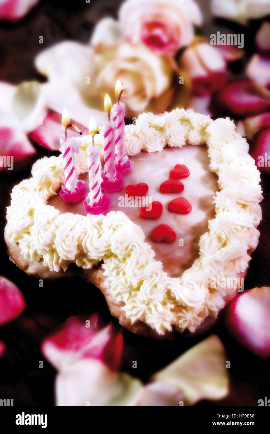 Heart shaped cake with candles hi-res stock photography and images - Alamy