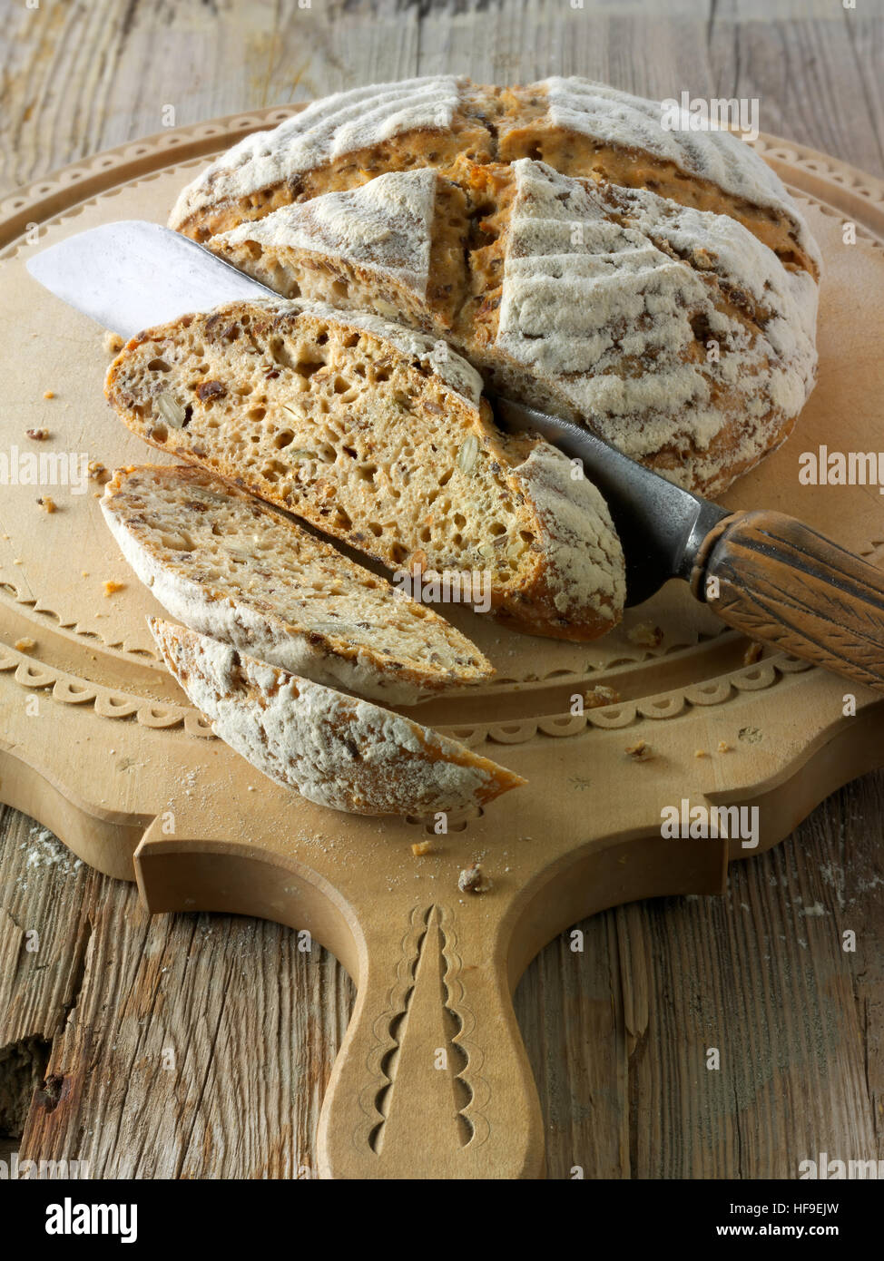 Artisan sour dough wholemeal seed bread with white, malted rye flour Stock Photo