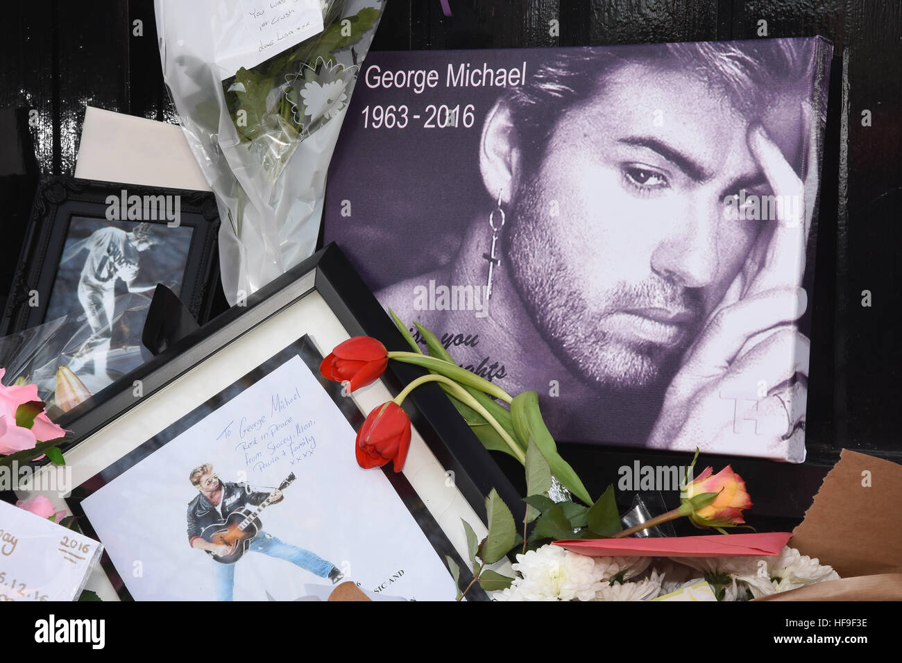 Floral tributes to George Michael placed outside of his London home. Following his death on 25.12.16, The Grove, Highgate, London UK Stock Photo