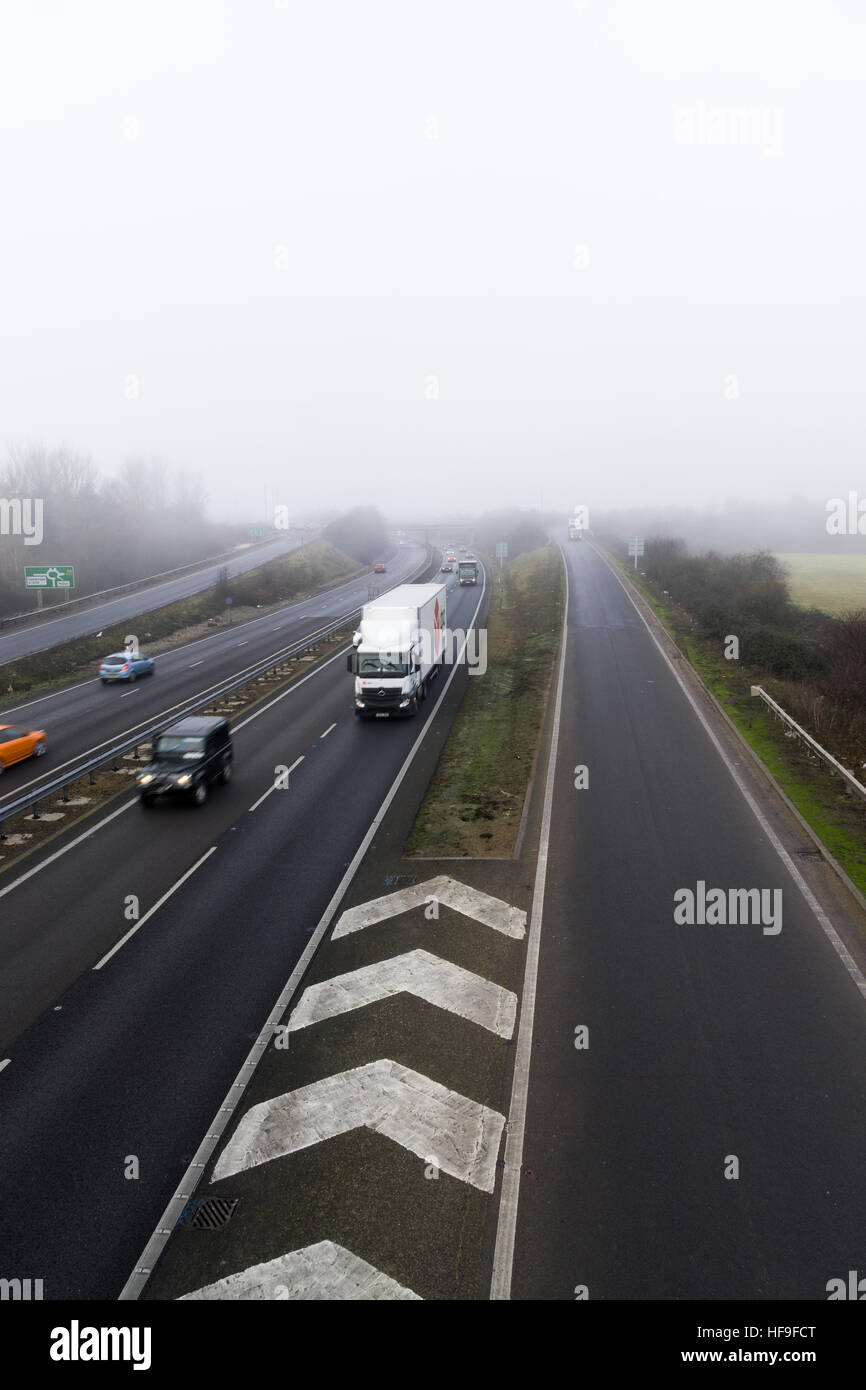 Fog on A14 at Milton interchange Milton Cambridge Cambridgeshire England 2016 Stock Photo