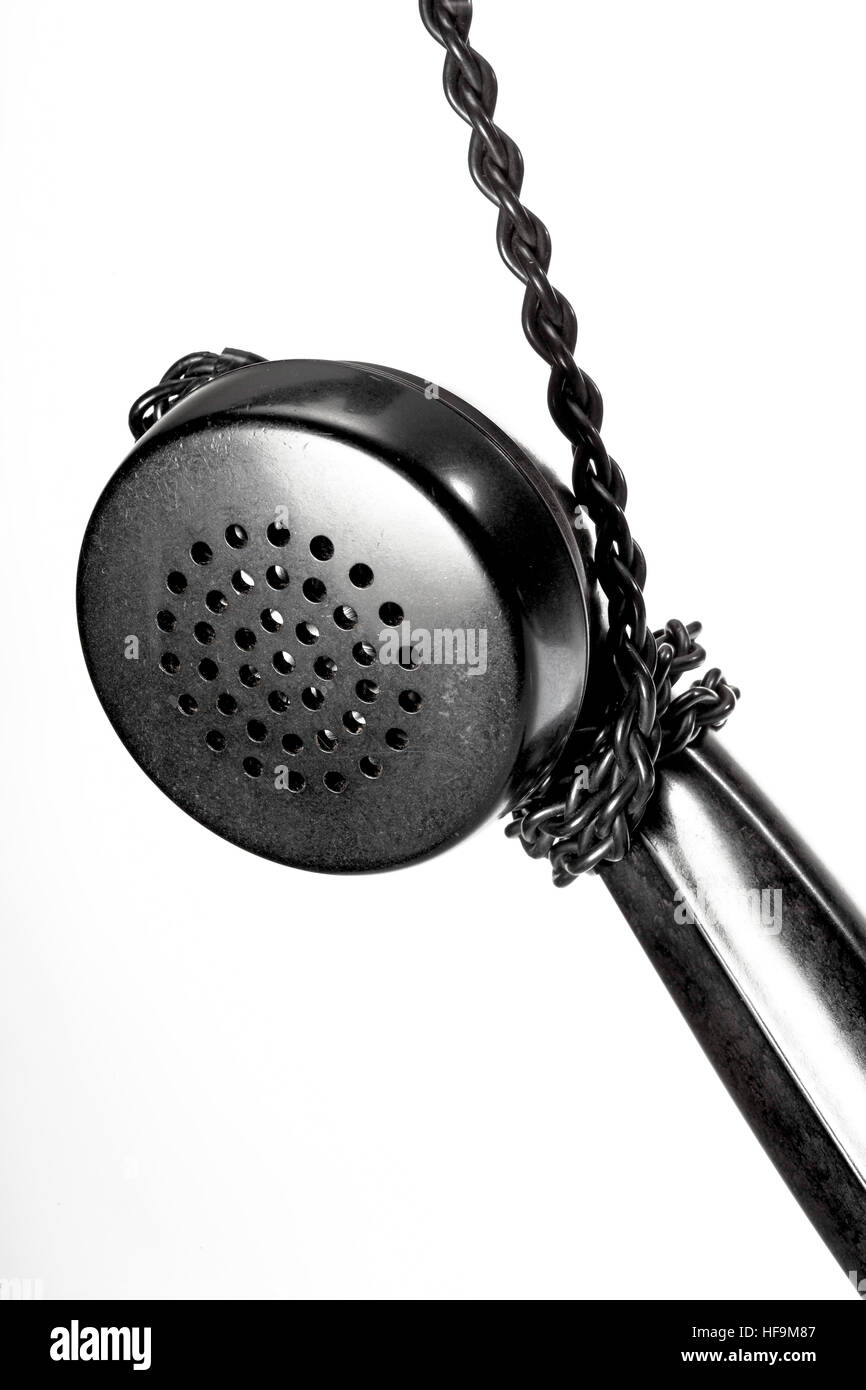 Telephone receiver hanging from cable Stock Photo Alamy