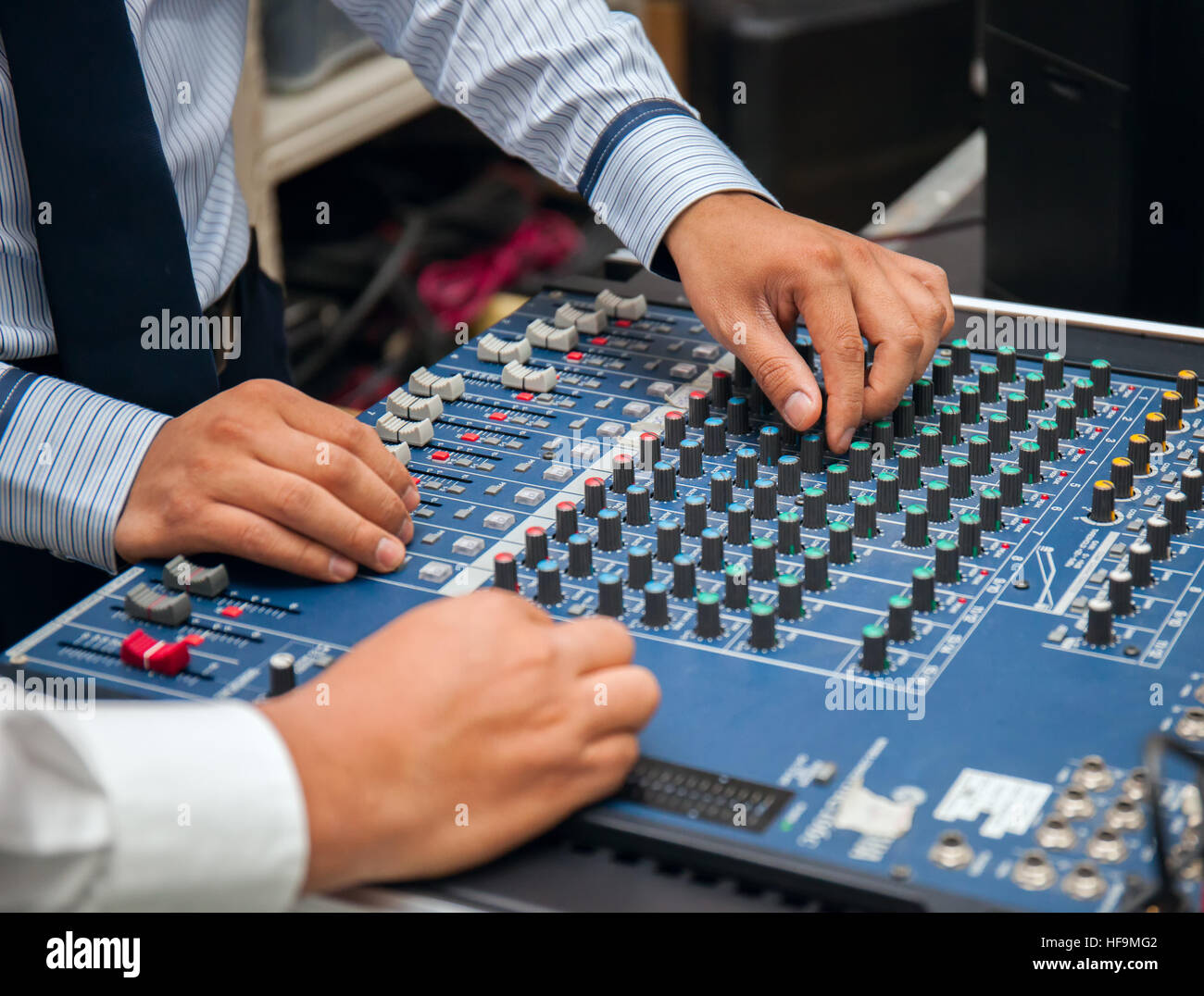 man hands tuning of sound mixer Stock Photo Alamy