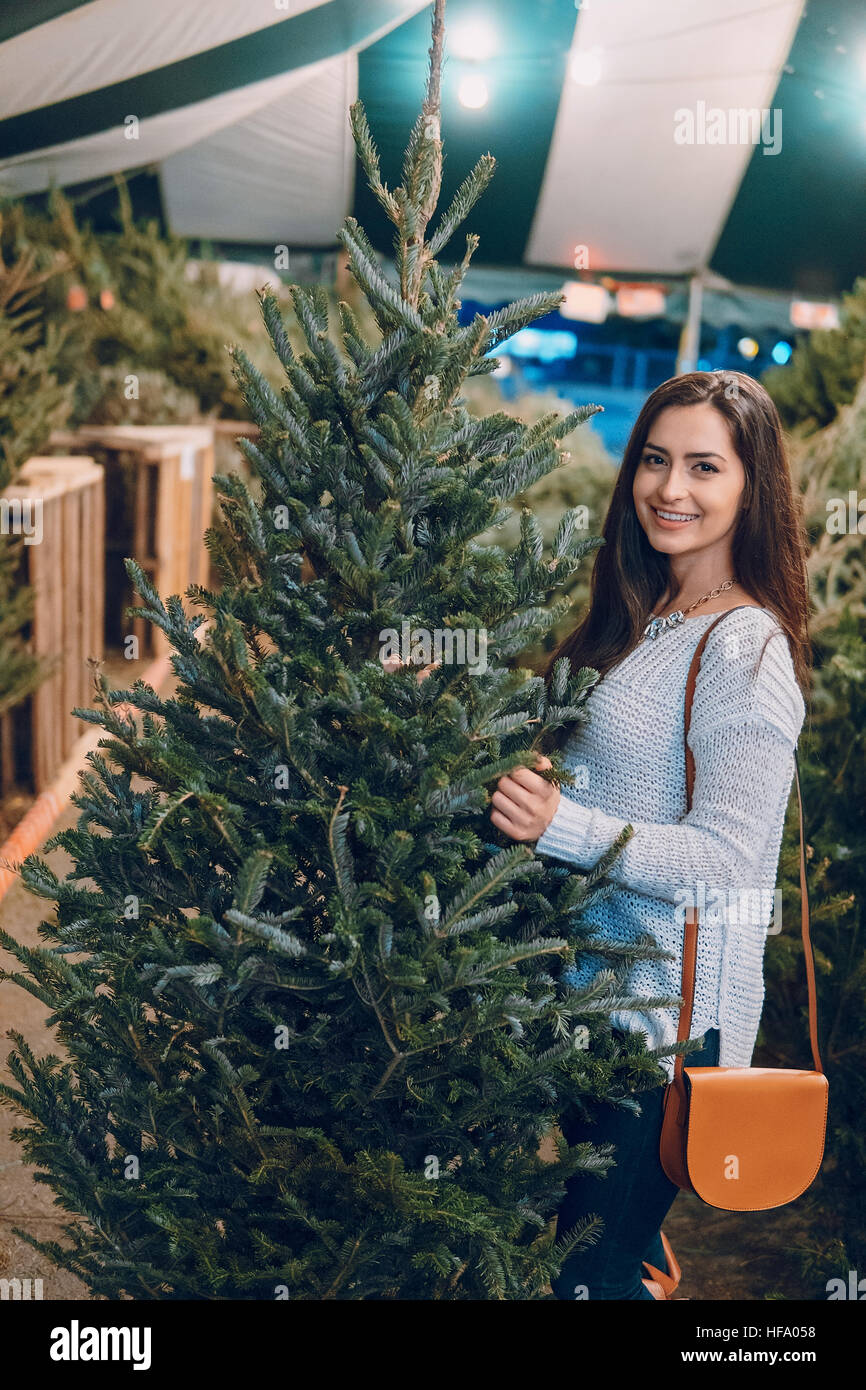 girl and Christmas tree Stock Photo - Alamy