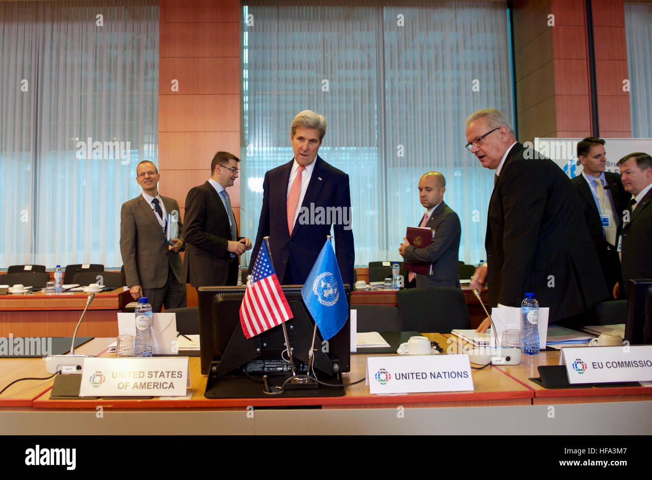 U.S. Secretary of State John Kerry takes his seat on October 5, 2016, at the European Commission's Justus Lipsius Building in Brussels, Belgium, before the start of an international Afghan pledging conference. Stock Photo