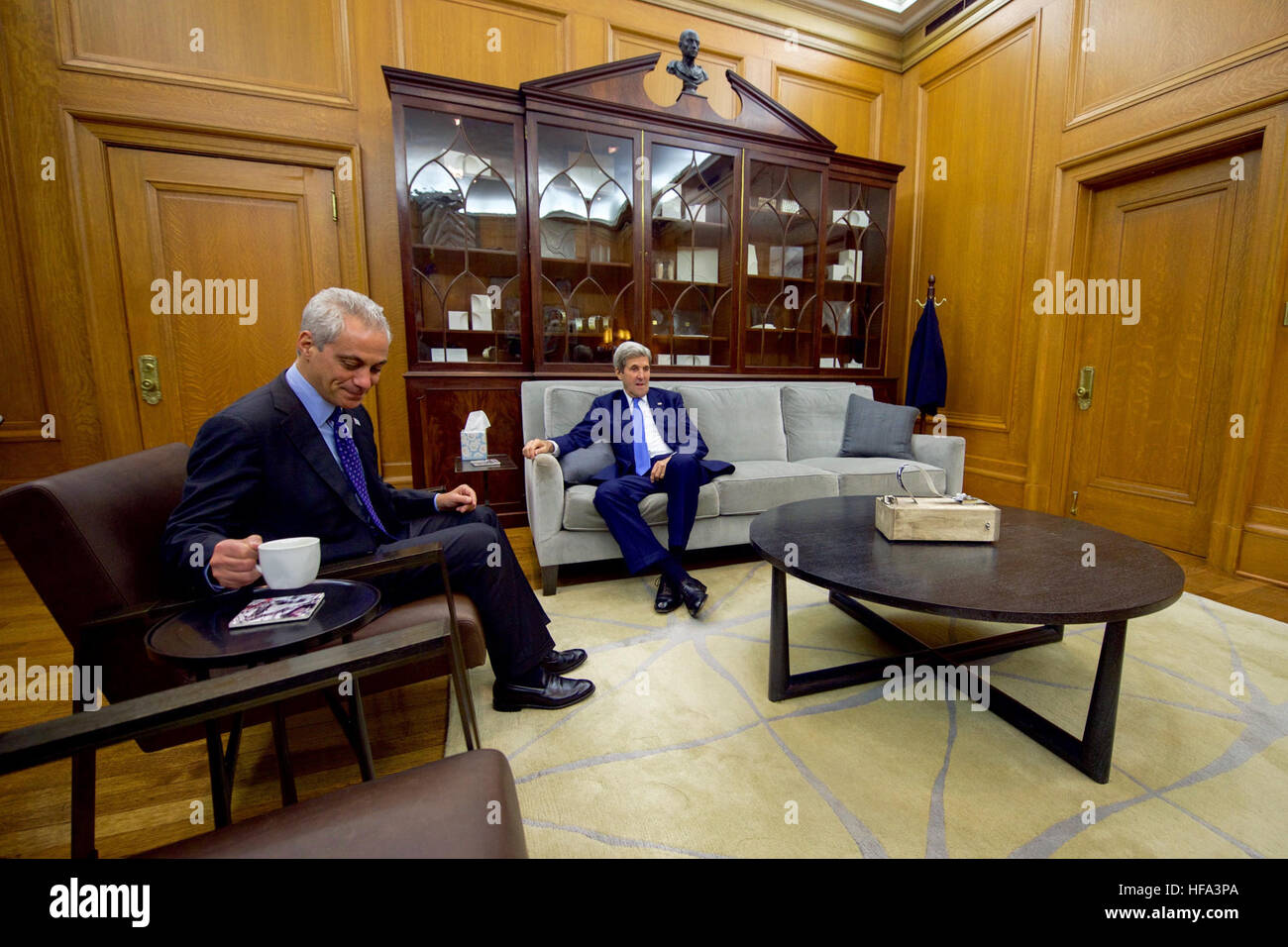 Chicago Mayor Rahm Emanuel sits with . Secretary of State John Kerry in  his inner office at City Hall after the Secretary arrived for a courtesy  call during a day stop in
