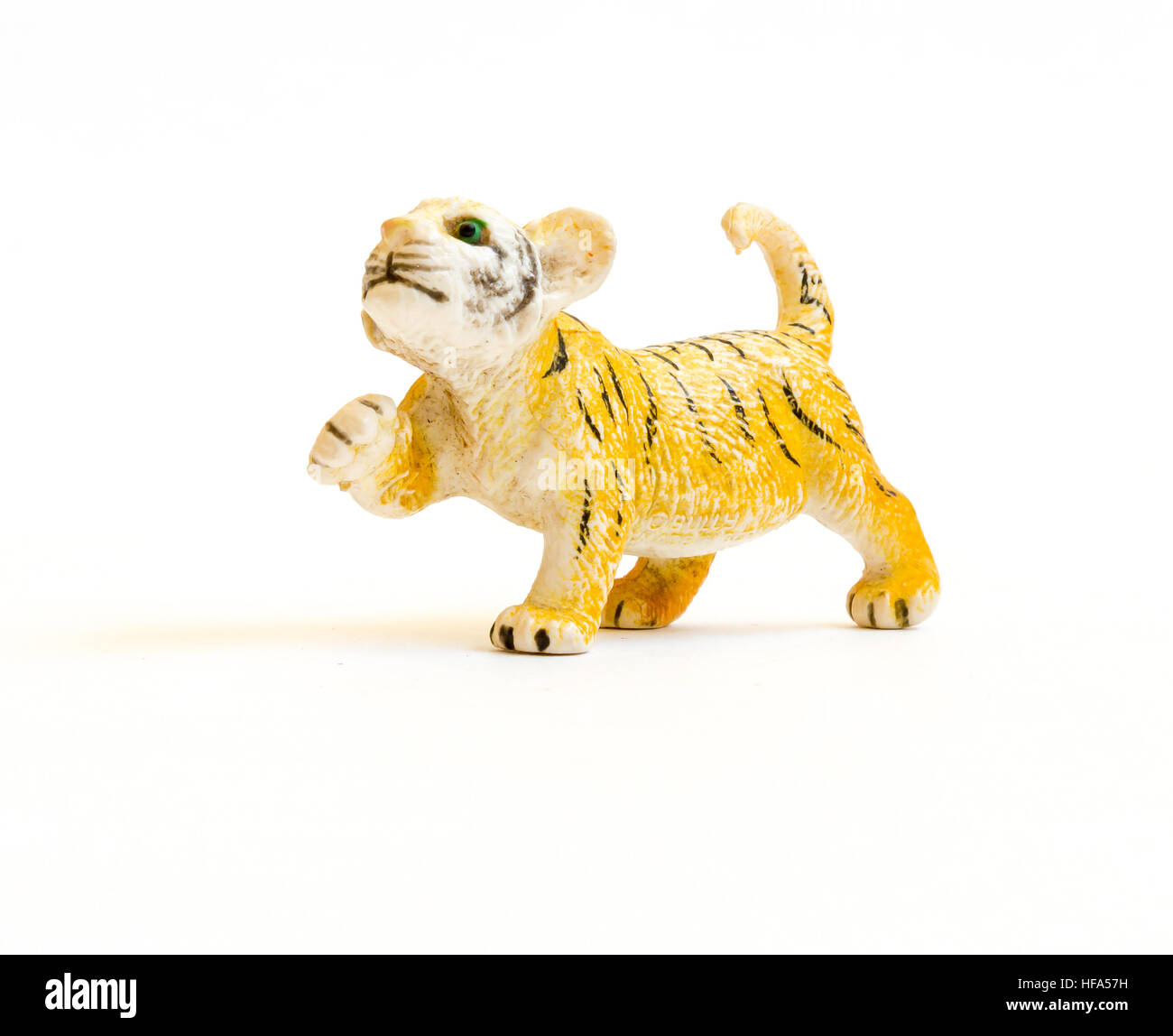 The Miniature isolated toy tiger. Stock Photo