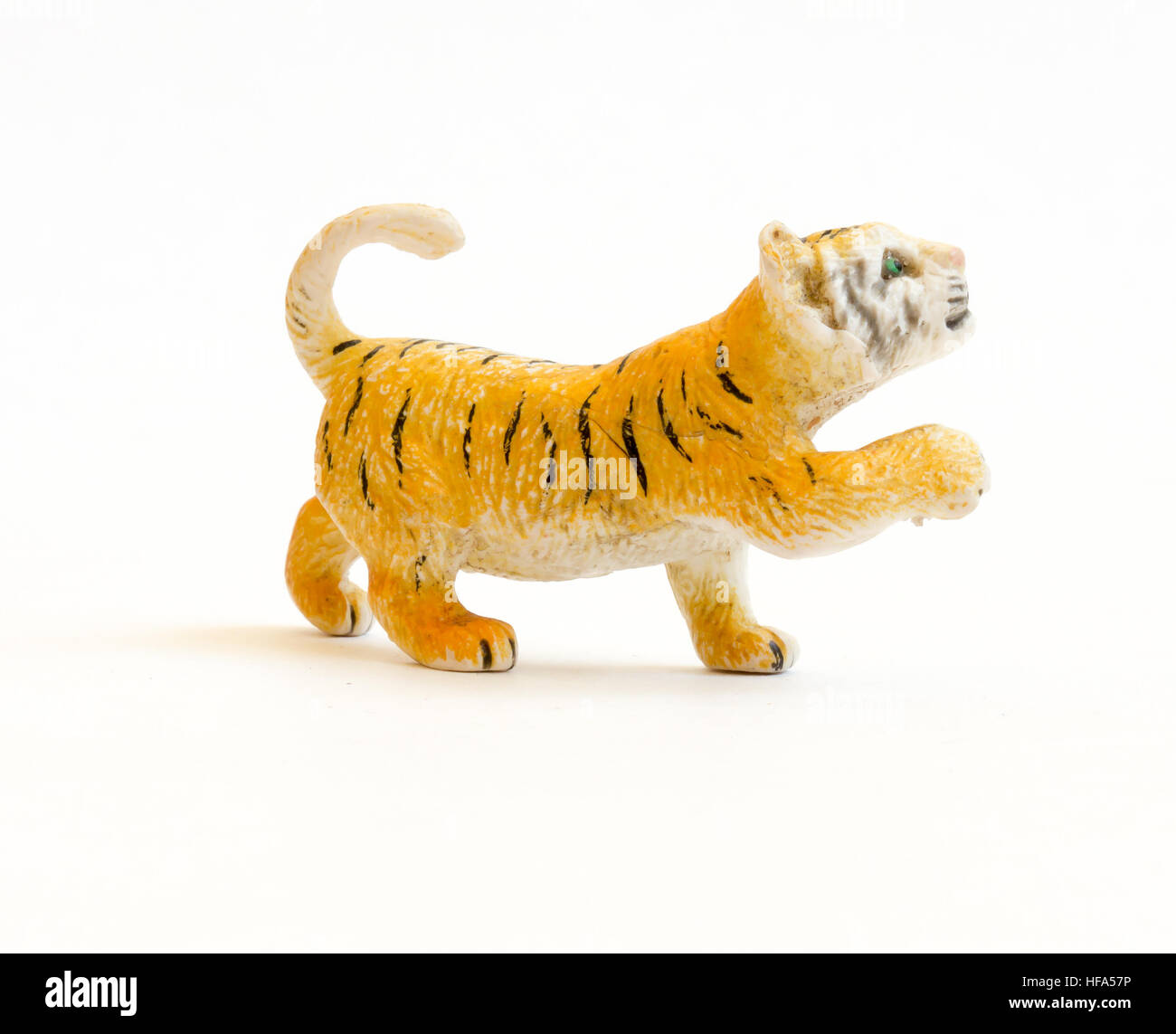 The Miniature isolated toy tiger. Stock Photo