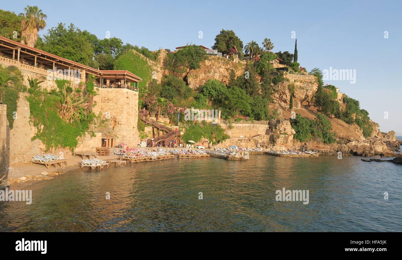 Mermerli Beach and Restaurant with the City Walls in Antalyas Oldtown Kaleici, Turkey Stock Photo