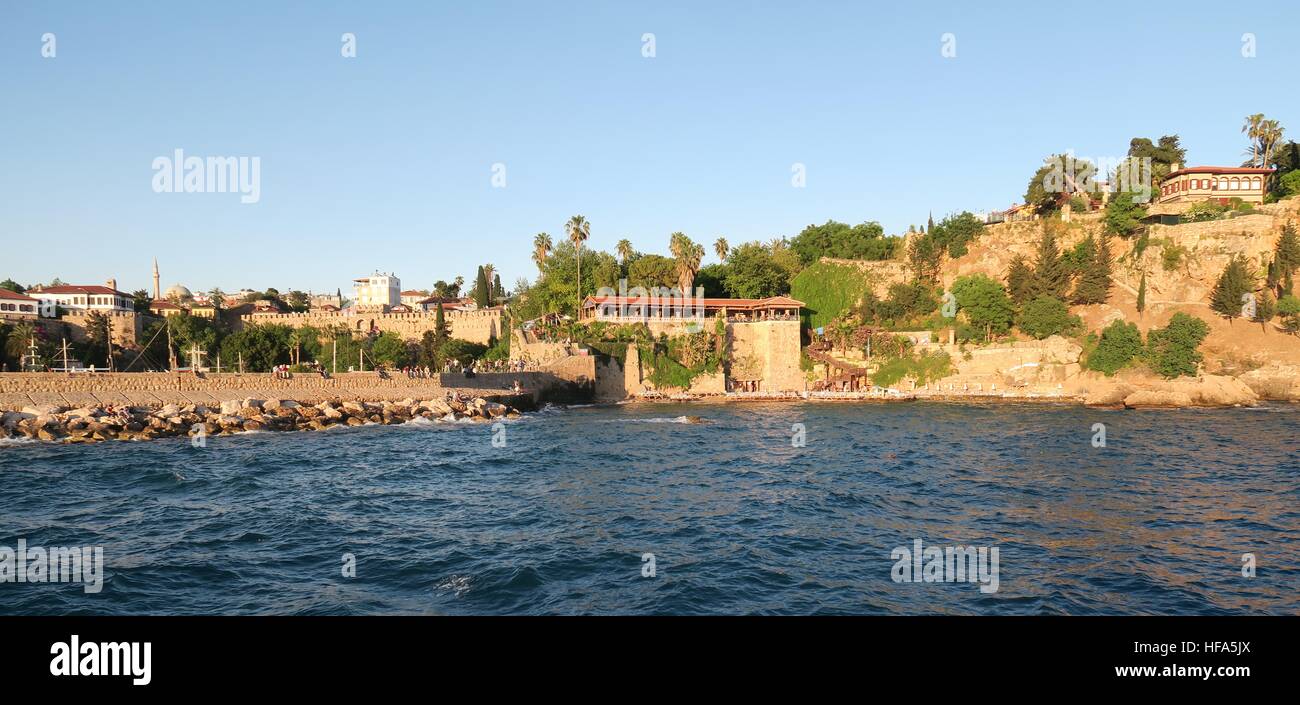 Antalya: Mermerli Beach and Restaurant with the Harbour, City Walls in the Oldtown Kaleici, Turkey Stock Photo