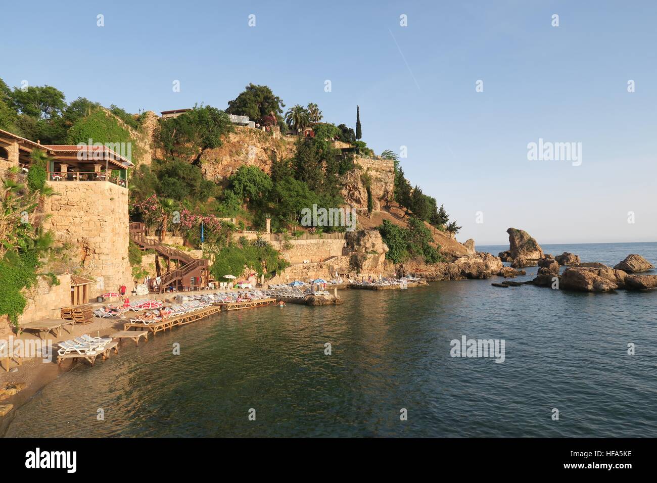 Mermerli Beach and Restaurant with the City Walls in Antalyas Oldtown Kaleici, Turkey Stock Photo