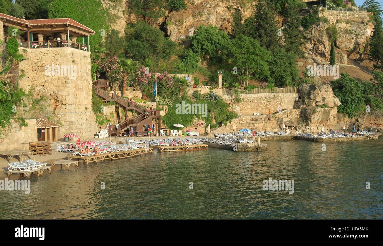 Mermerli Beach and Restaurant with the City Walls in Antalyas Oldtown Kaleici, Turkey Stock Photo