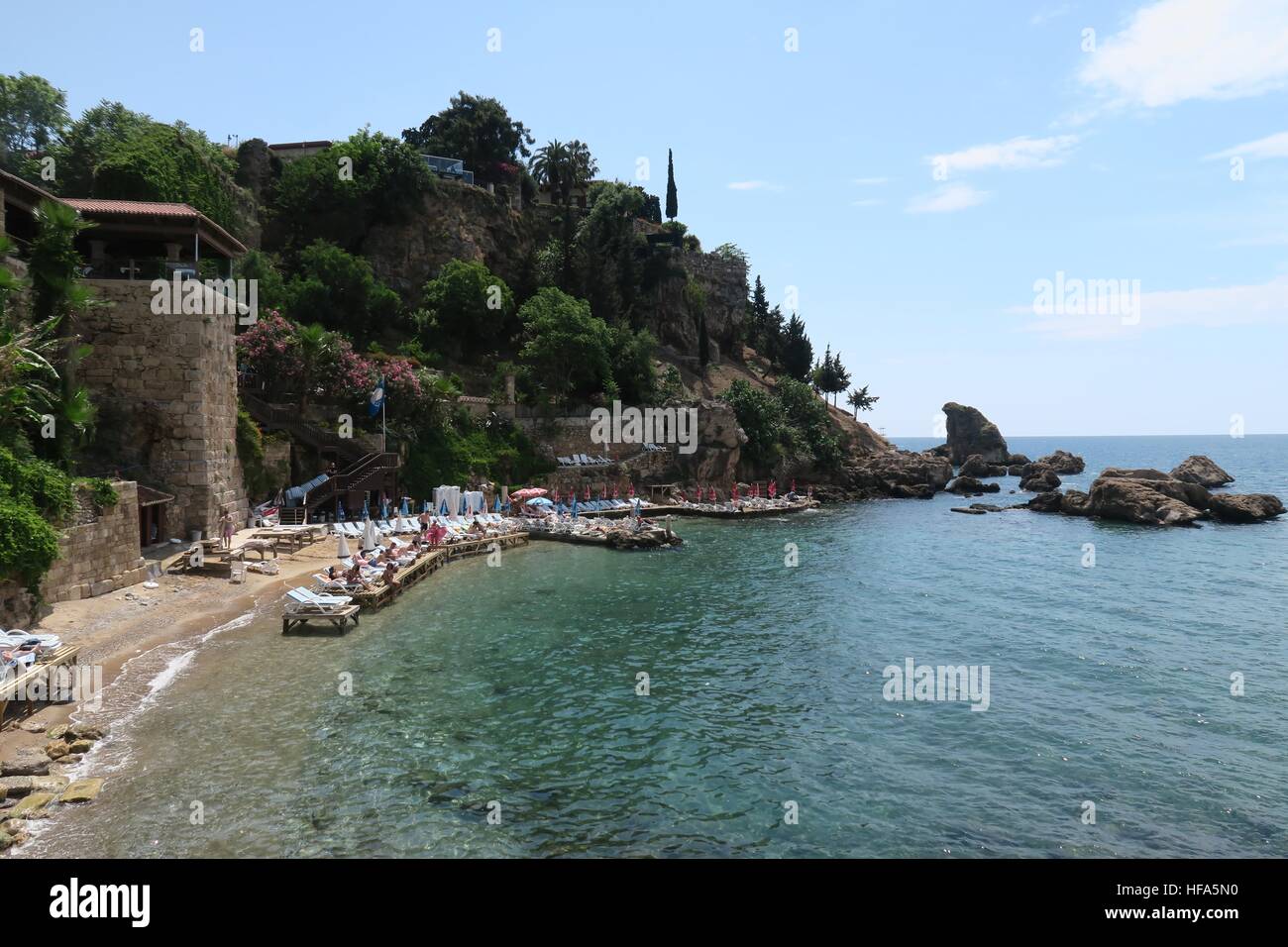 Mermerli Beach and Restaurant with the City Walls in Antalyas Oldtown Kaleici, Turkey Stock Photo