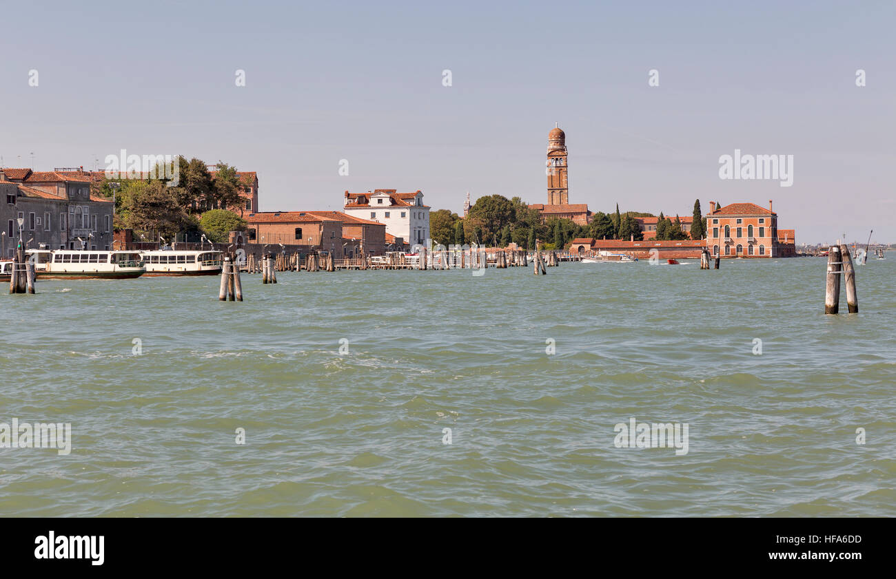 Lagoon and cityscape with Casino Degli Spiriti ancient building and Madonna Church bell tower in Venice, Italy. Stock Photo