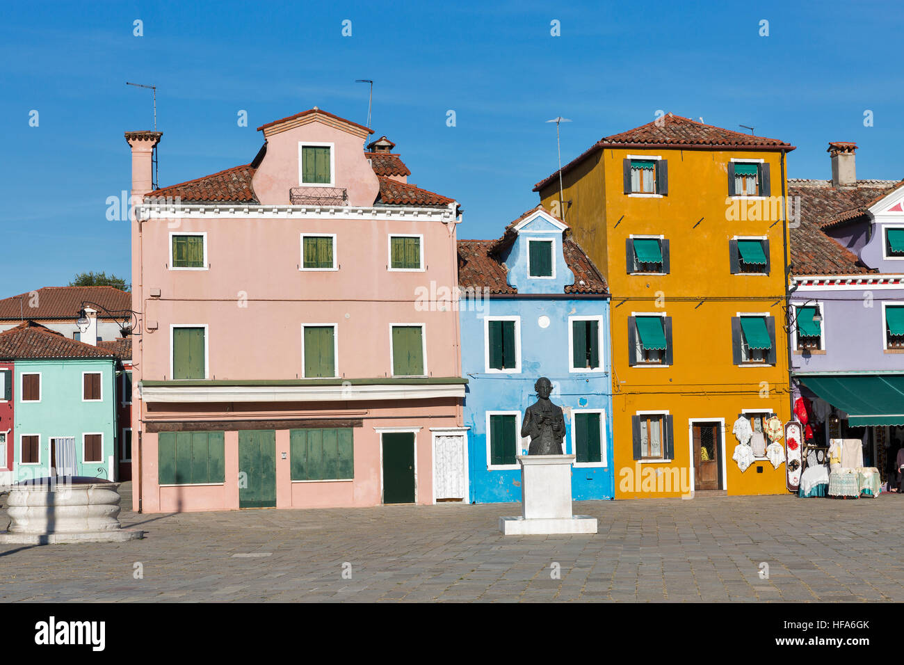 Central square and monument to Baldassare Galuppi, byname Il Buranello on the famous island Burano. Venice and the Venetian lagoon are on the UNESCO W Stock Photo