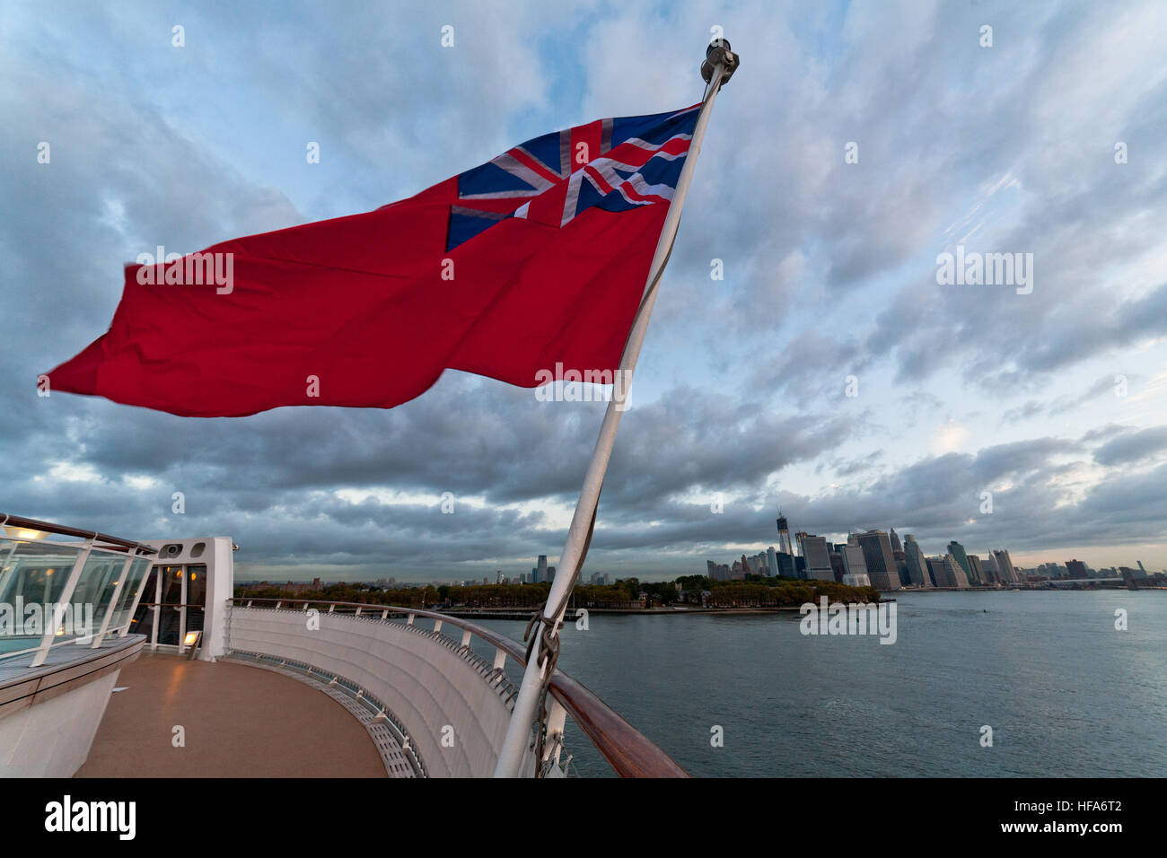 British Ensign Red Ensign Flag Flying On The Deck Of The Queen Mary 2 Cruise Ship With New York City Skyline In The Background Stock Photo Alamy
