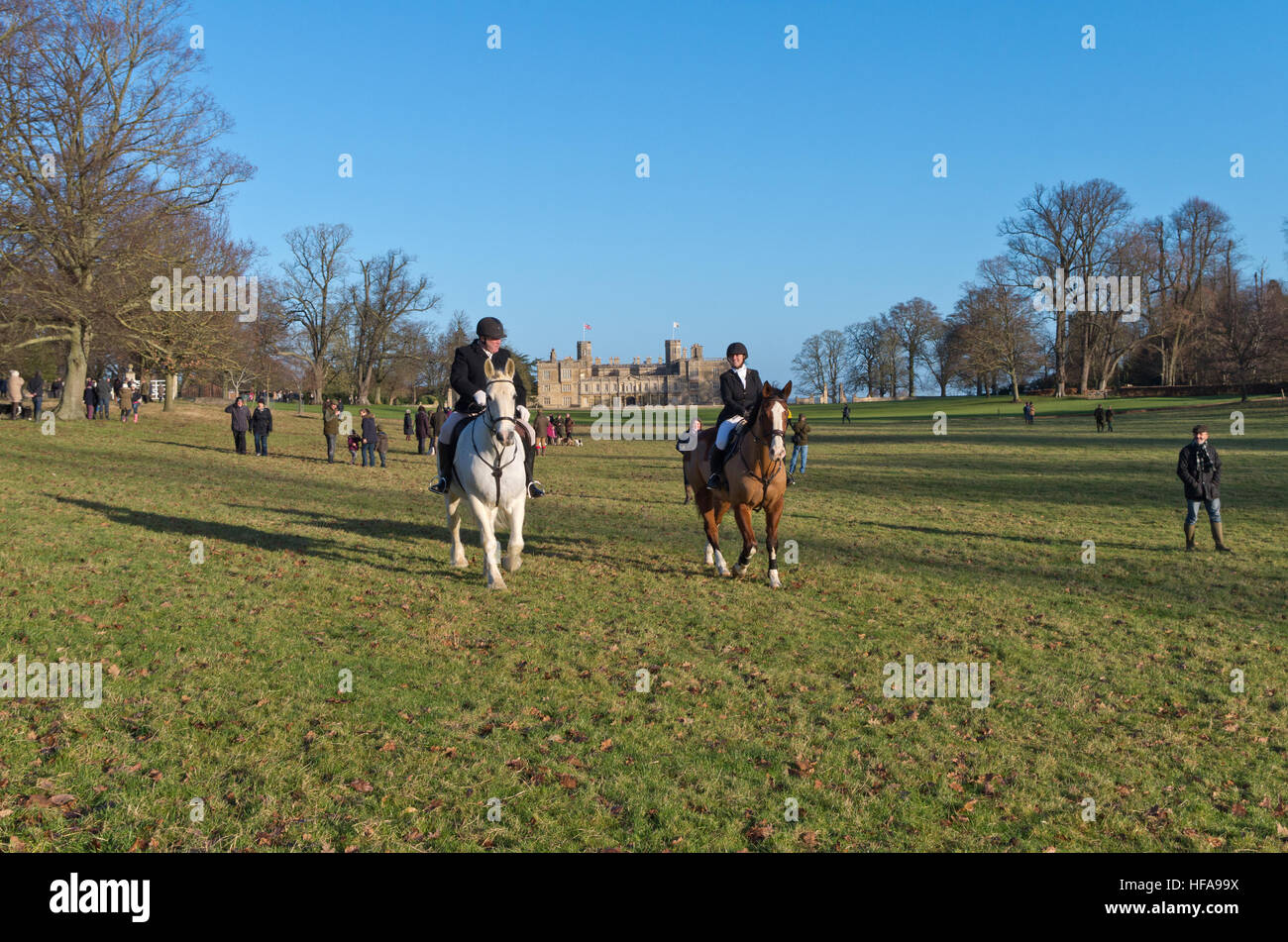 Two riders, members of the Oakley Hunt, in the grounds of Castle Ashby for the annual Boxing Day meet. Stock Photo