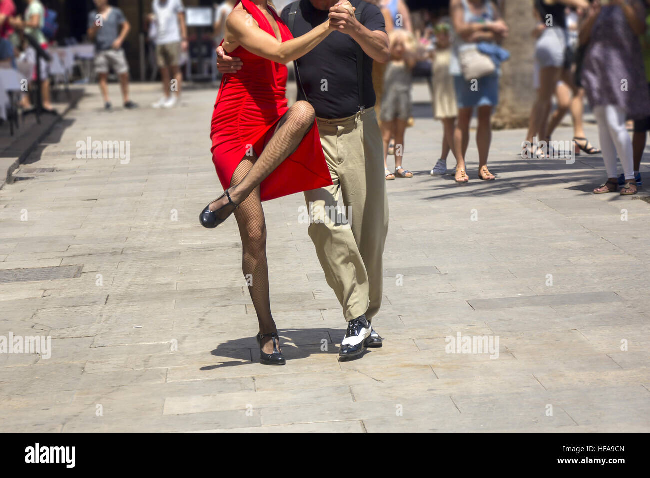 Street dancers performing tango in the street among the people Stock Photo