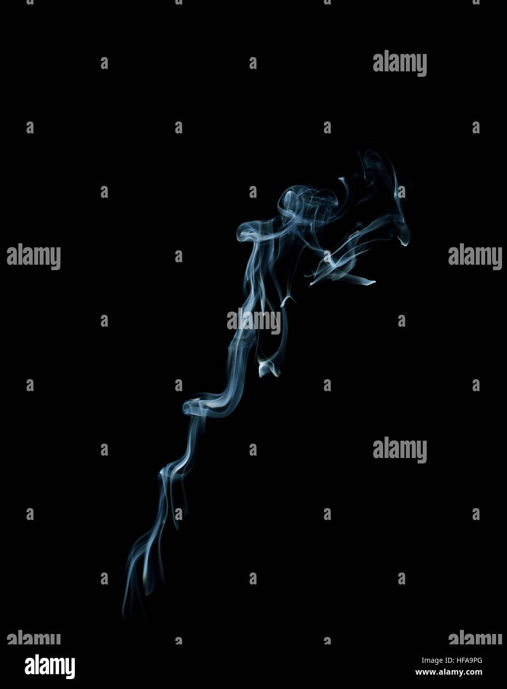 blue smoke trail isolated on black background Stock Photo - Alamy