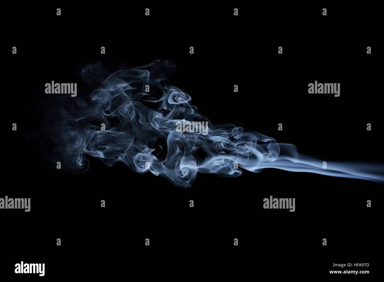 Abstract blue smoke waves isolated on black Stock Photo - Alamy