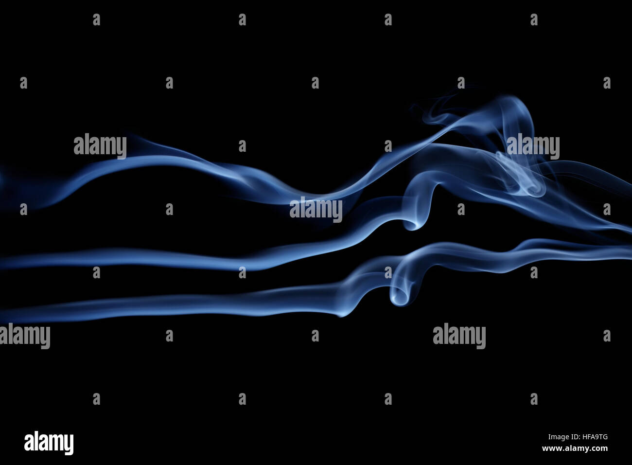 Abstract blue waves isolated on black Stock Photo - Alamy