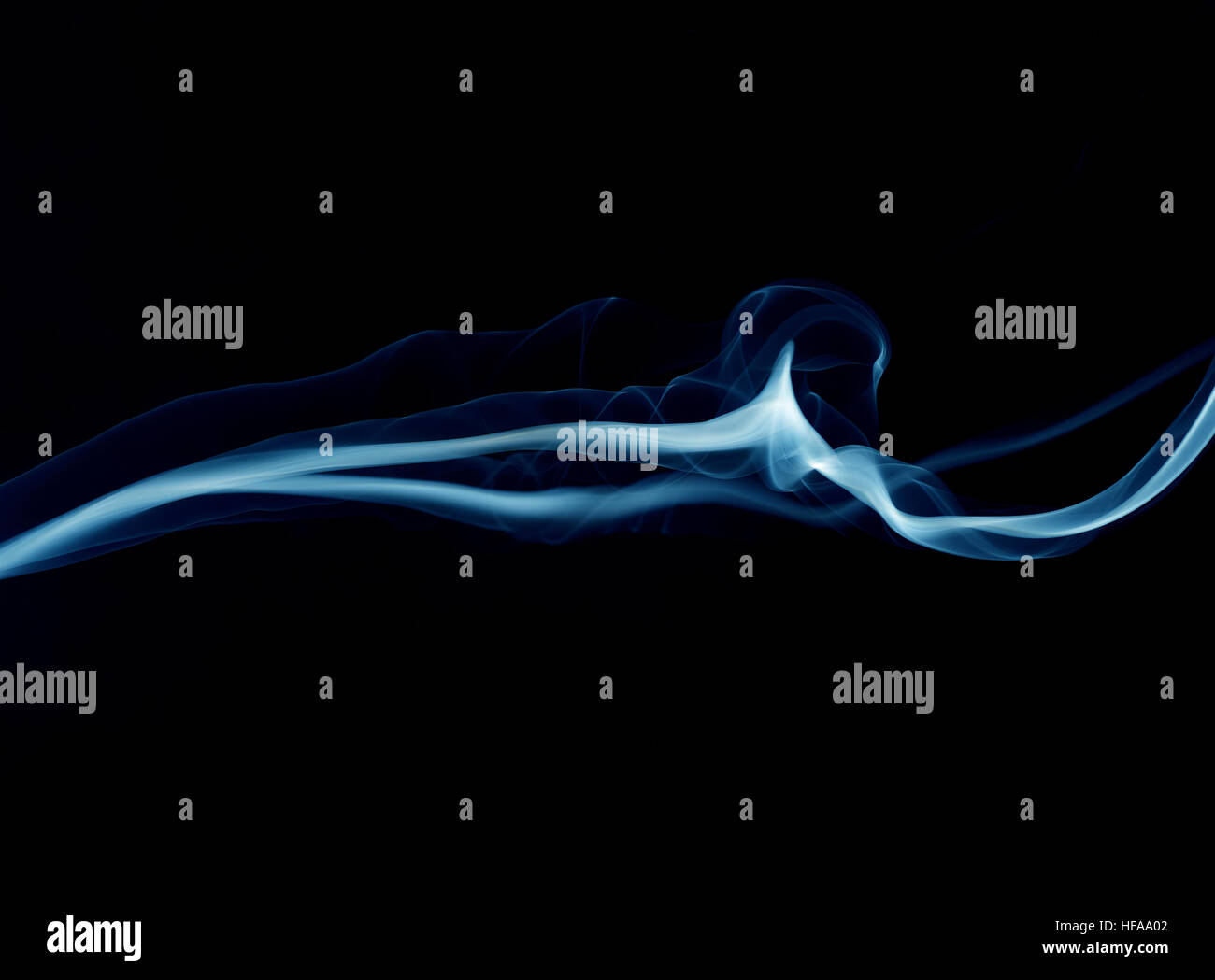 Blue smoke wave isolated on black Stock Photo - Alamy