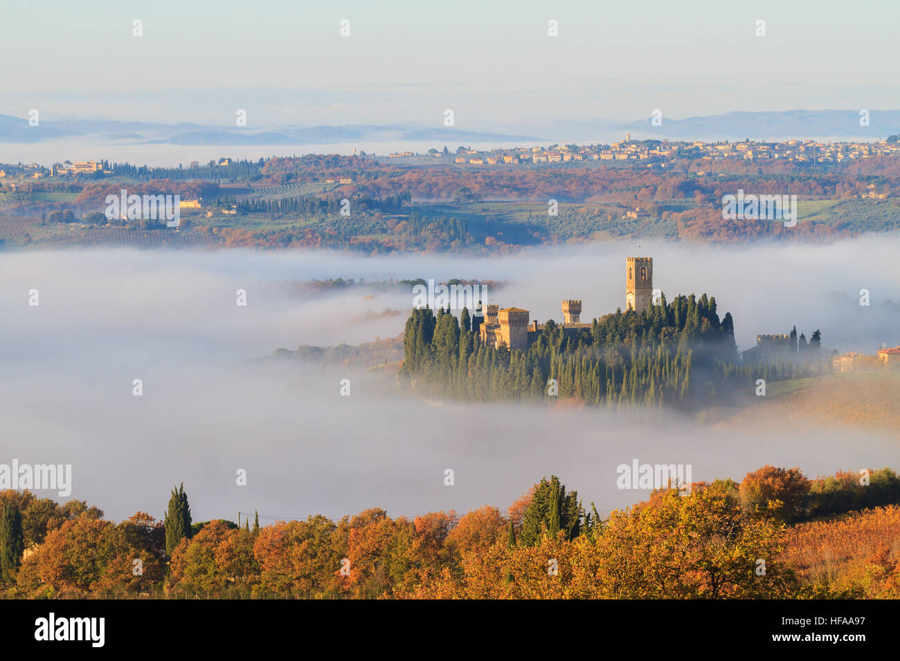 Tavarnelle Val di Pesa, November 2016: Abbey of Passignano and vineyard landscape in autumn with fog, on November 2016 in Tavarnelle Val di Pesa, Ital Stock Photo