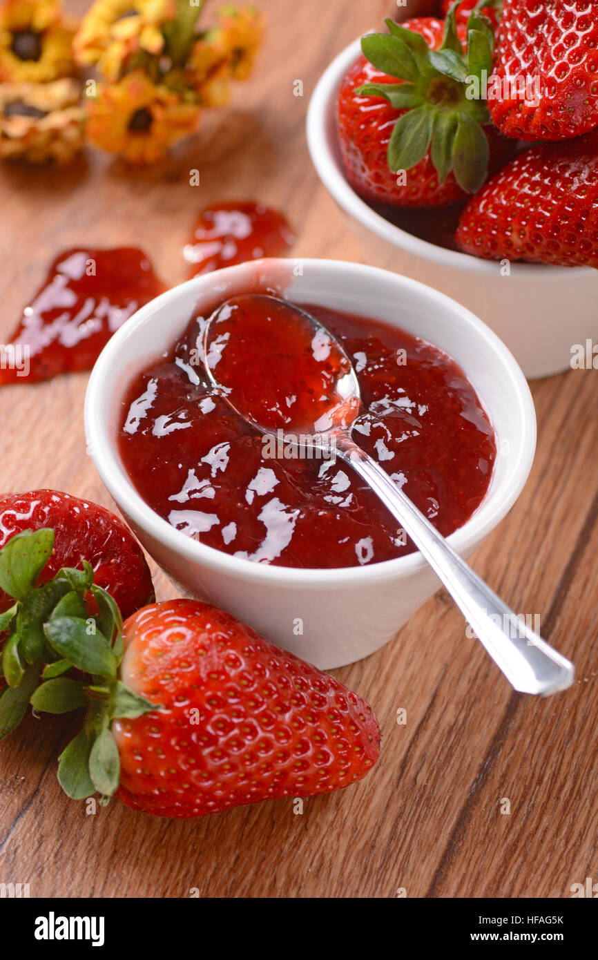 strawberry jam with fruit around Stock Photo Alamy