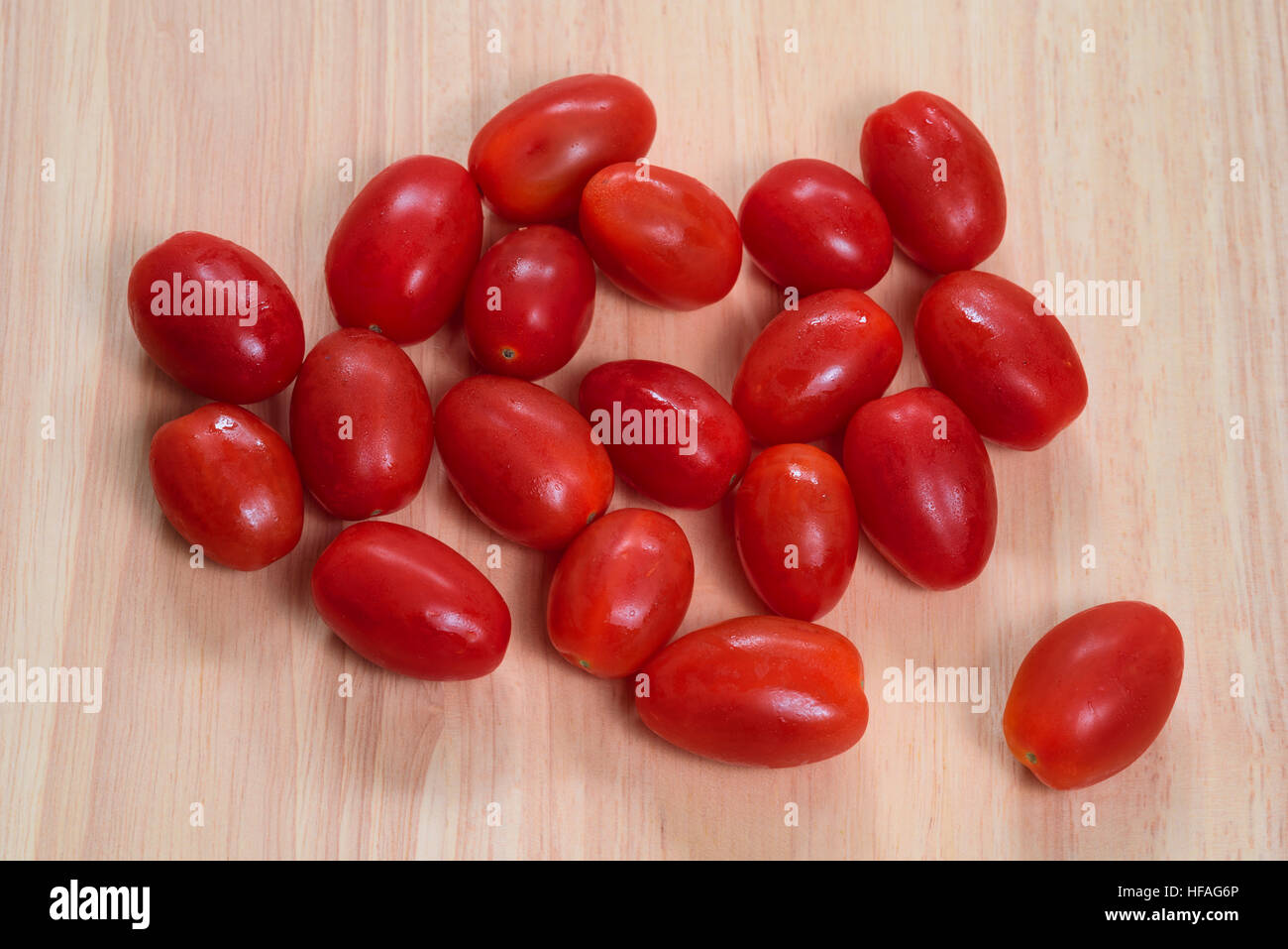 Group of plum tomatoes, shot from above. Stock Photo