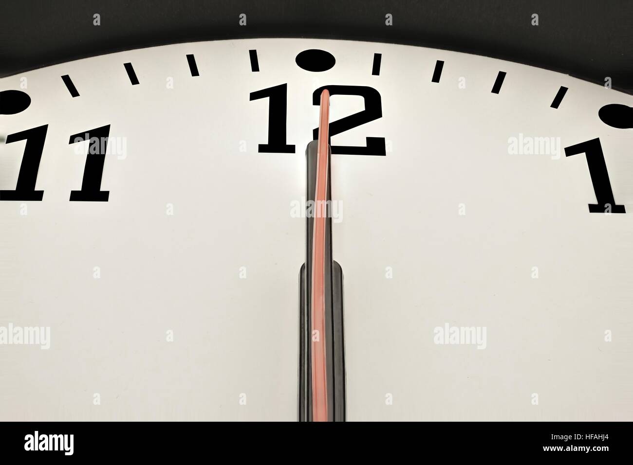 Clock shows point twelve or midnight Stock Photo