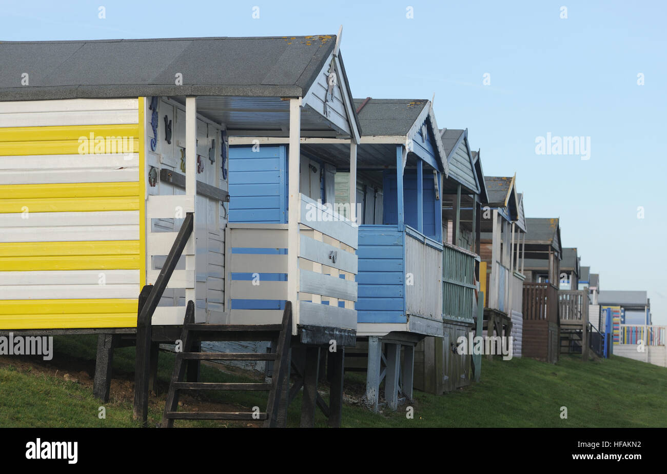 Brightly painted beach huts at Tankerton Bay. Whitstable, Kent, UK Stock Photo