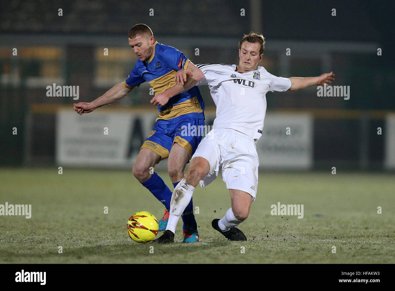Danny Cossington of Romford and Ronnie Winn of Thurrock during Romford vs Thurrock, Ryman League Division 1 North Football at Ship Lane on 28th Decemb Stock Photo