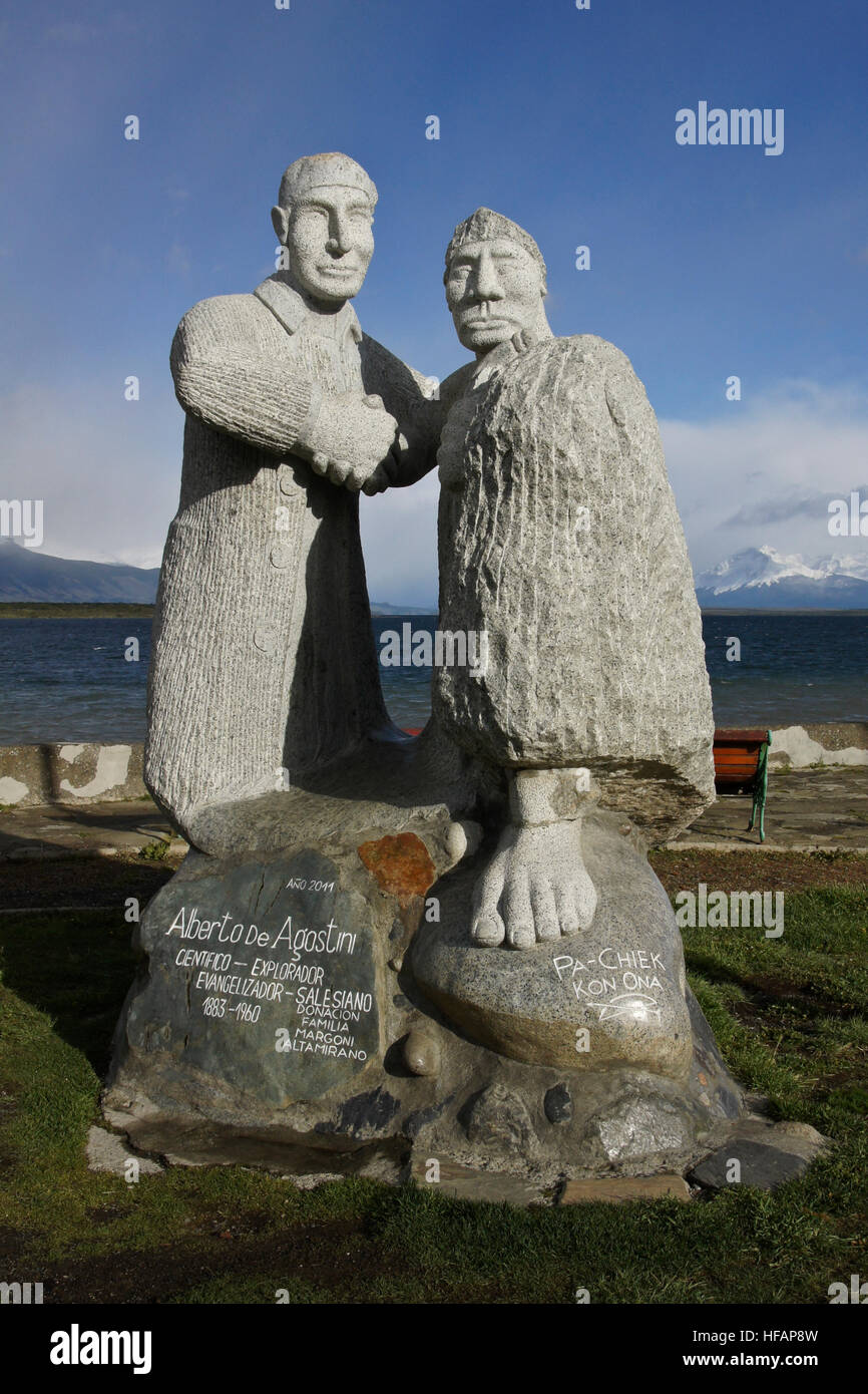 Stone sculpture of explorer Alberto de Agostini and indigenous man, Puerto Natales, Patagonia, Chile Stock Photo