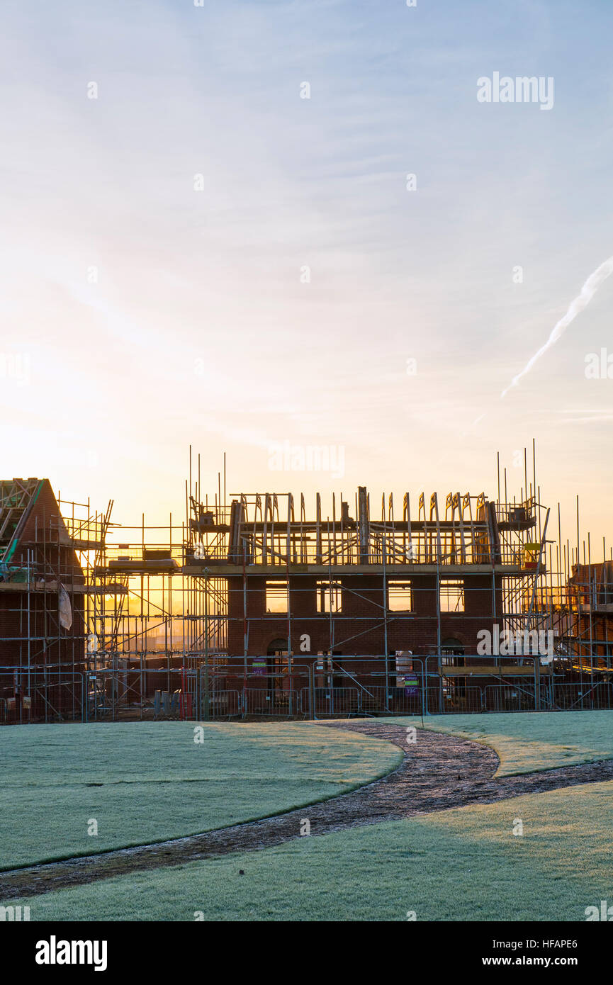 New housing development at sunrise. Silhouette. Banbury, Oxfordshire, England Stock Photo
