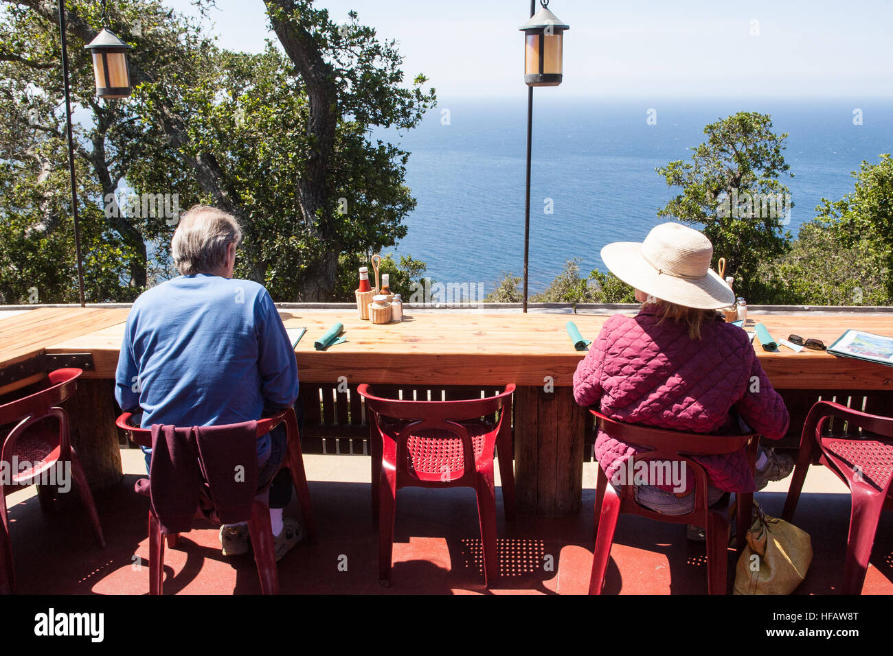 At Nepenthe Cafe Kevah,restaurant outdoor seating with views of the Pacific Ocean at Big Sur,California,USA. Stock Photo