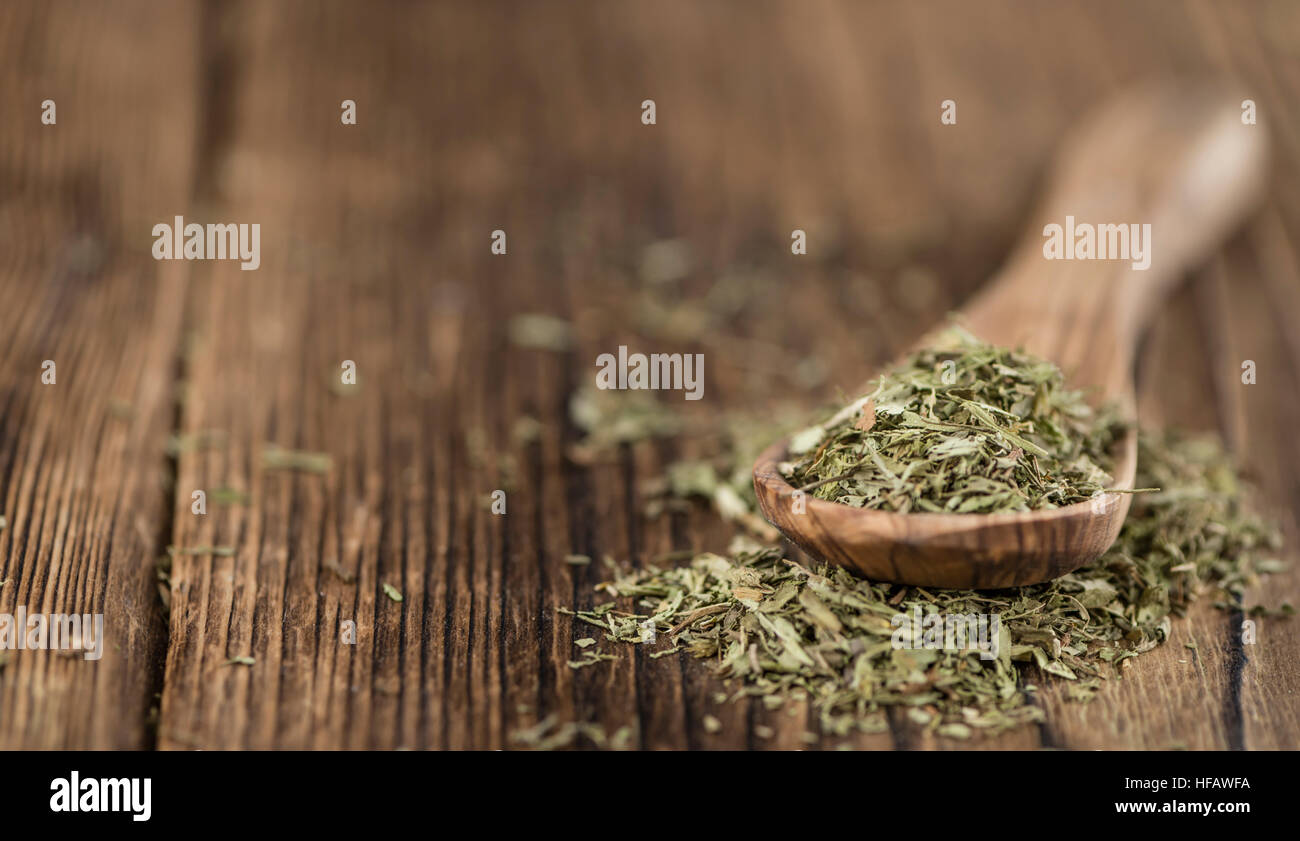 Dried Stevia leaves (selective focus) on vintage background Stock Photo