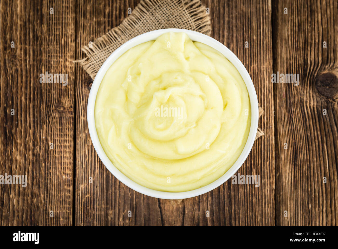 Potato Mash on rustic wooden background (close-up shot) Stock Photo