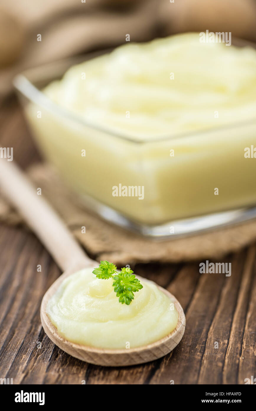 Potato Mash on rustic wooden background (close-up shot) Stock Photo