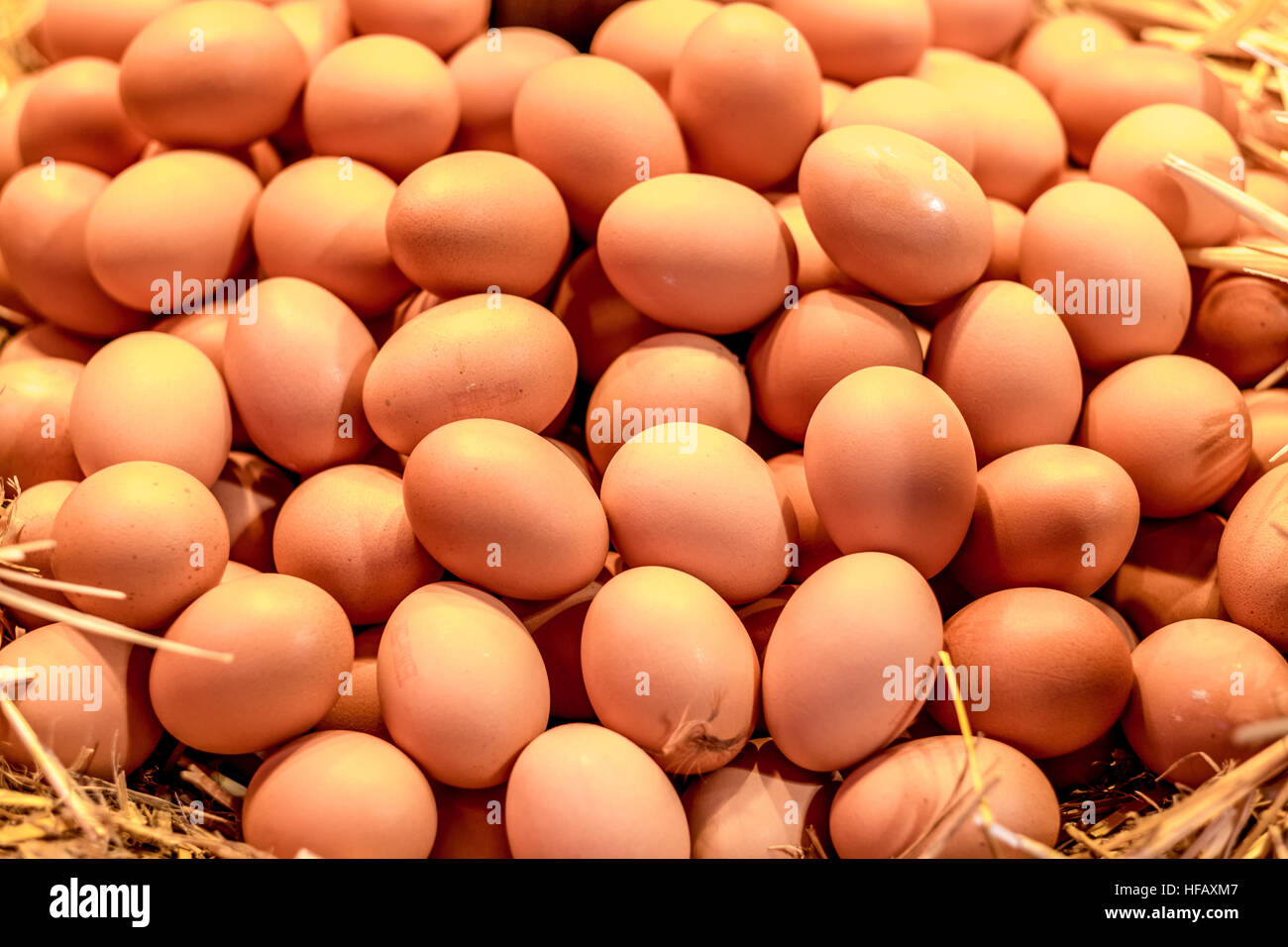 Lovely farm fresh brown eggs for sale in La Boqueria market Barcelona. Stock Photo