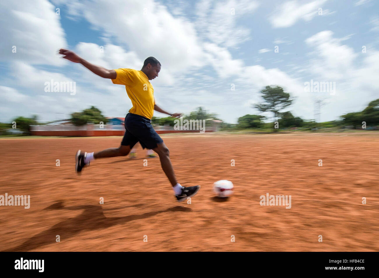 150520-N-XQ474-037 PUERTO CABEZAS, Nicaragua (May 20, 2015) Hospital Corpsman 3rd Class Sewagegn Sintayehu, a native of Silver Spring, Md., assigned to Naval Hospital Camp Lejeune, N.C., participates in a community soccer game with local  citizens in support of Continuing Promise 2015. Continuing Promise is a U.S. Southern Command-sponsored and U.S. Naval Forces Southern Command/U.S. 4th Fleet-conducted deployment to conduct civil-military operations including humanitarian-civil assistance, subject matter expert exchanges, medical, dental, veterinary and engineering support and disaster respon Stock Photo