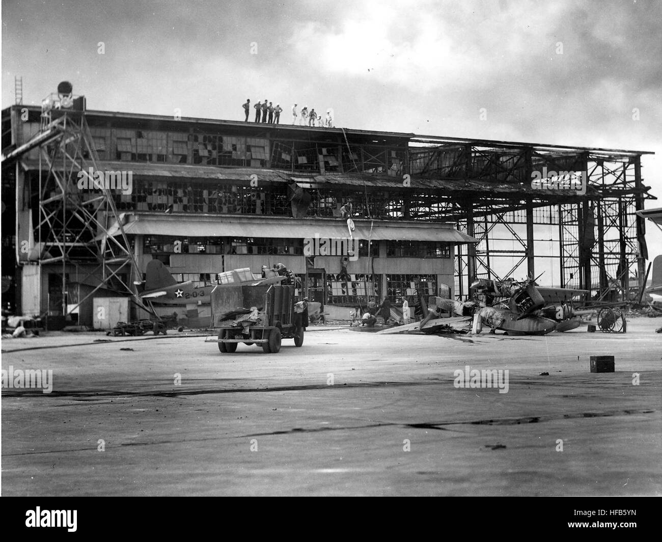 Damaged hangar on Ford Island in December 1941 Stock Photo