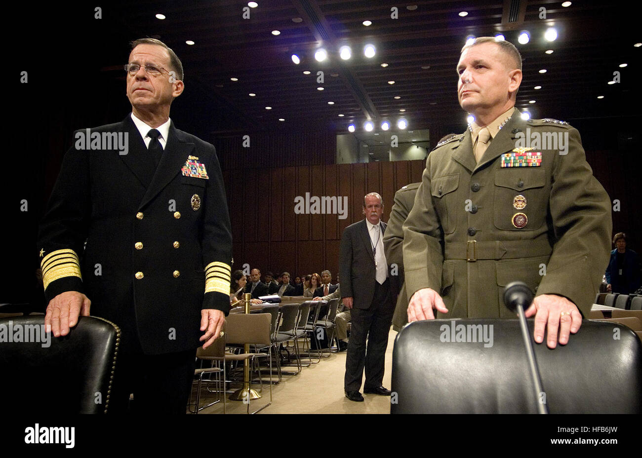 070731-N-0696M-021 WASHINGTON, D.C. (July 31, 2007) - Chief of Naval Operations, Adm. Mike Mullen and Commander, U.S. Strategic Command, Gen. James E. Cartwright, prepare to testify during their confirmation hearing in front of the Senate Armed Services Committee for appointment to Chairman and Vice-Chairman of the Joint Chiefs of Staff at Hart Senate Office Building, July 31, 2007. DoD photo by Mass Communication Specialist 1st Class Chad J. McNeeley (RELEASED) Defense.gov photo essay 070731-N-0696M-021 Stock Photo