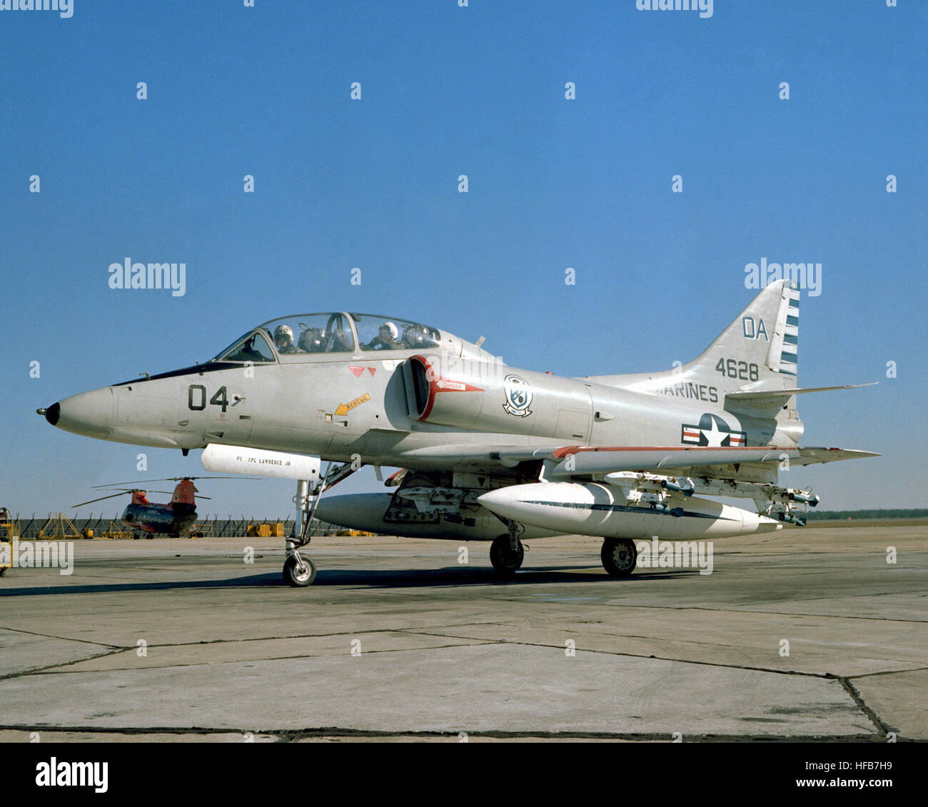 A left side view of a Marine TA-4F Skyhawk aircraft preparing to taxi from the flight line.  The TA-4F is from the Headquarters and Maintenance Squadron-32. DM-SC-82-07690 Stock Photo