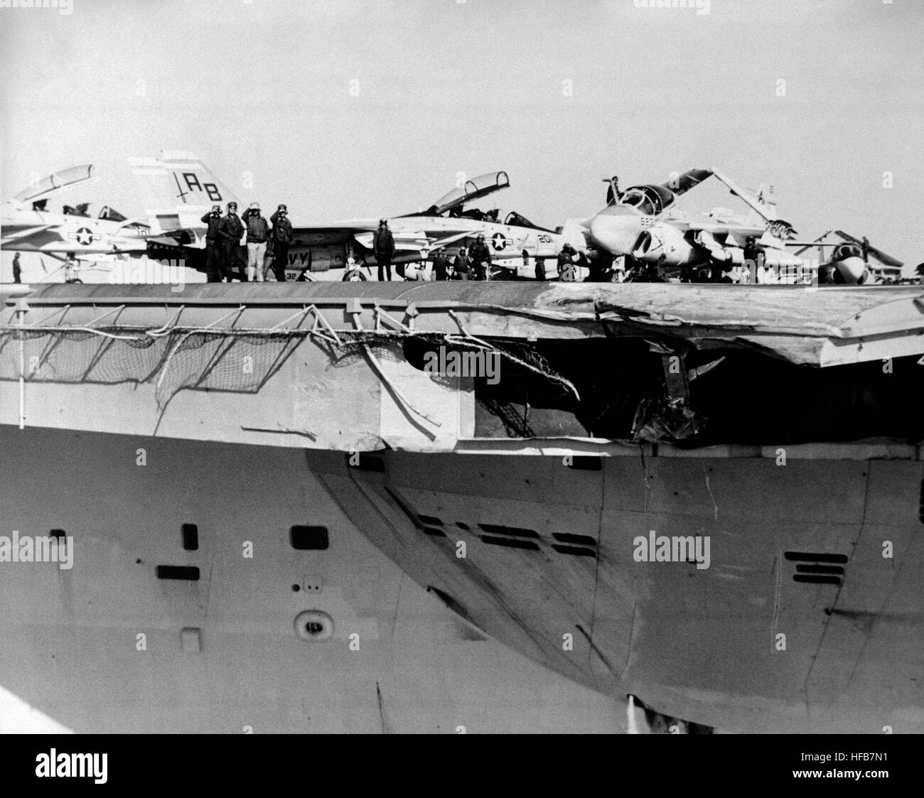 A view of damage sustained by the aircraft carrier USS JOHN F. KENNEDY (CV 67) when it collided with the guided missile cruiser USS BELKNAP (CG 26) during night operations on November 22, 1975. DN-SN-87-07322 USS John F. Kennedy damaged front end of angled deck Stock Photo