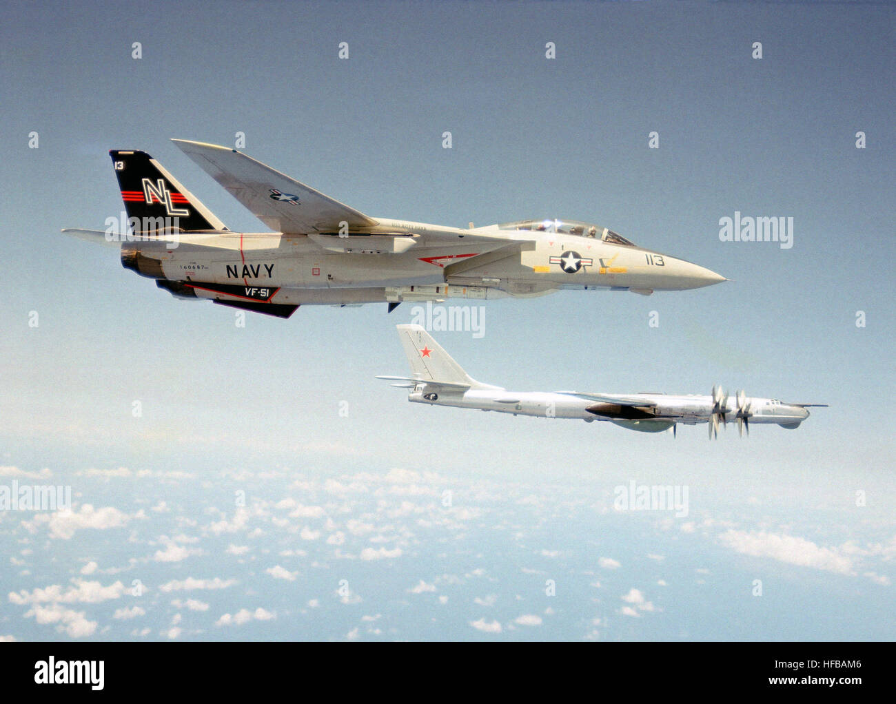 An F-14 Tomcat from Fighter Squadron 51 (VF-51) intercepts a Soviet Tu ...