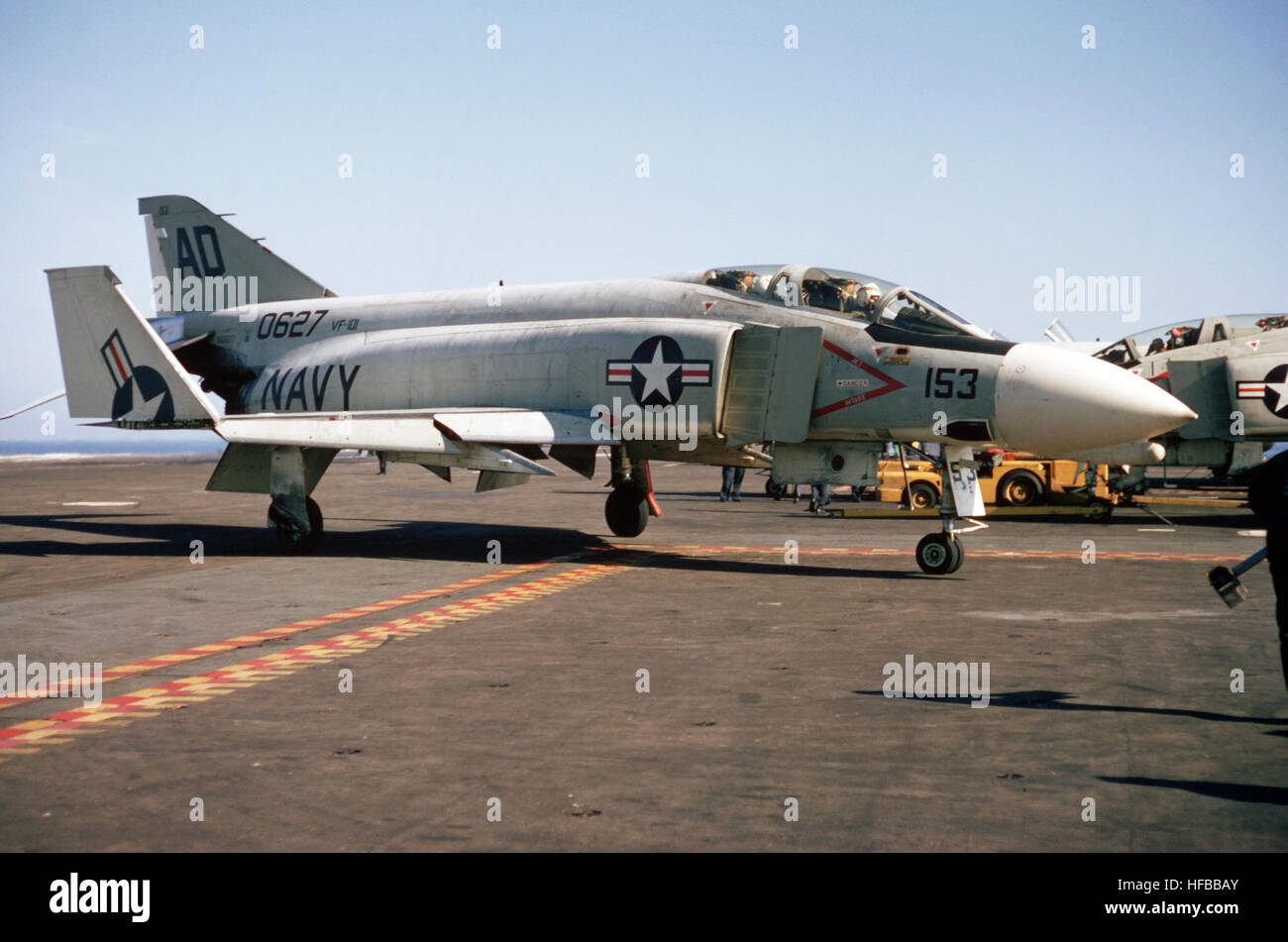 A Fighter Squadron 101 (VF-101) F-4J Phantom II aircraft taxis on the flight deck of the attack aircraft carrier USS AMERICA (CVA 66). F-4J Phantom II VF-101 Stock Photo