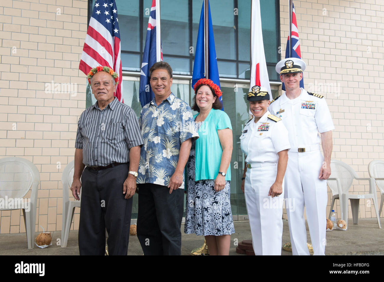 150622-N-MK341-035 Kolonia, POHNPEI, (June 22, 2015) – (Left to right) Federated States of Micronesia, Vice President His Excellency Yosiwo George, Pohnpei Acting Governor, Marcelo Peterson, U.S. Ambassador to the Federated States of Micronesia, Doria Rosen, U.S. Defense Representative to the Federated States of Micronesia, Rear Adm. Bette Bolivar, and Commodore, Task Force Forager, Capt. James Meyer, pause for a photo following an opening reception June 22. The Federated States of Micronesia is the Military Sealift Command joint high speed vessel USNS Millinocket’s (JHSV 3) second stop of Pac Stock Photo