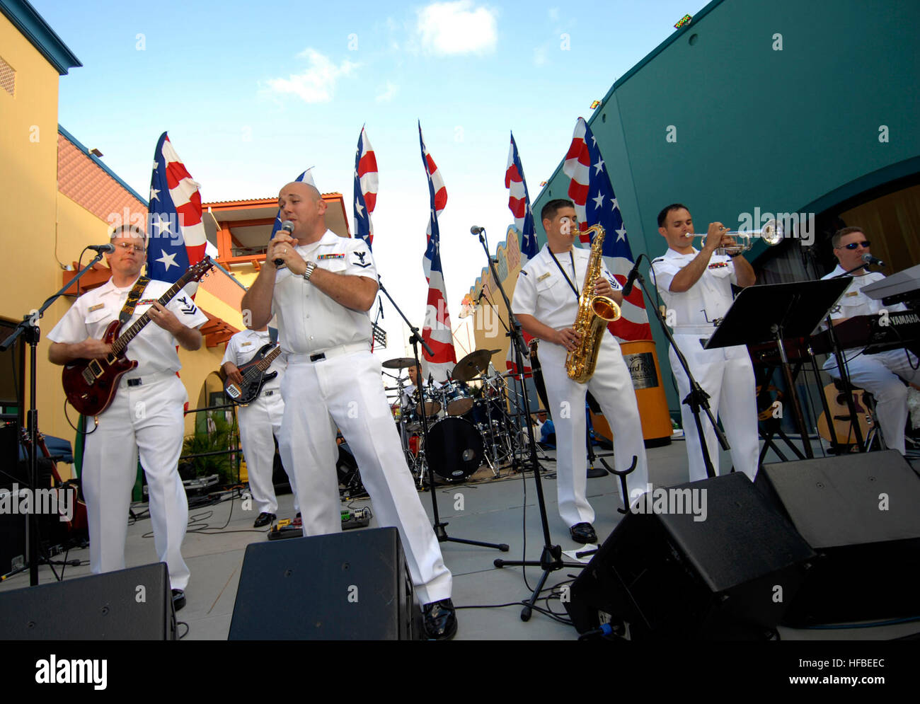Members of the Navy Region Southeast rock band, Pride, from left, Petty Officer 2nd Class Chris Morrison, guitar; Petty Officer 3rd Class Sean Meyer, vocals; Petty Officer 3rd Class Chris Castro, drums; Petty Officer 1st Class Louis Lebron, Saxophone; Petty Officer 3rd Class Jorge Argueta, trumpet and Petty Officer 3rd Class Gene Register, keyboards; entertain the crowd at the Seminole Hard Rock Hotel and Casino in Hollywood, Fla. More than 1,000 Sailors, Marines and Coast Guardsmen from the amphibious dock landing ship USS Ashland, the guided-missile destroyer USS Forrest Sherman, the Los-Ang Stock Photo