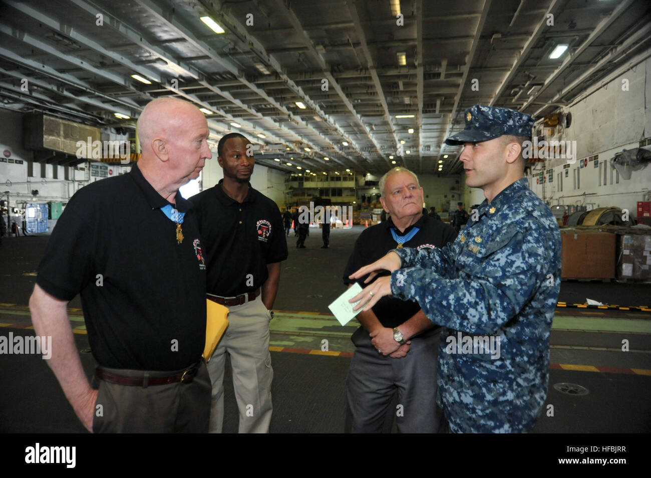 120519-N-MH885-035 YOKOSUKA, Japan (May 19, 2012) Medal of Honor recipients former U.S. Army Staff Sergeant Don Jenkins, left, and retired U.S. Army Sergeant Major Kenneth Stumpf tour the Japan-based, Nimitz-class aircraft carrier USS George Washington (CVN 73) after speaking with Sailors about their service in the military. Jenkins and Stumpf visited George Washington to tour the ship and speak to the Sailors as part of the Navy Exchange's customer appreciation weekend. George Washington is pierside at Fleet Activities Yokosuka making final preparations for its upcoming patrol. (U.S. Navy p Stock Photo