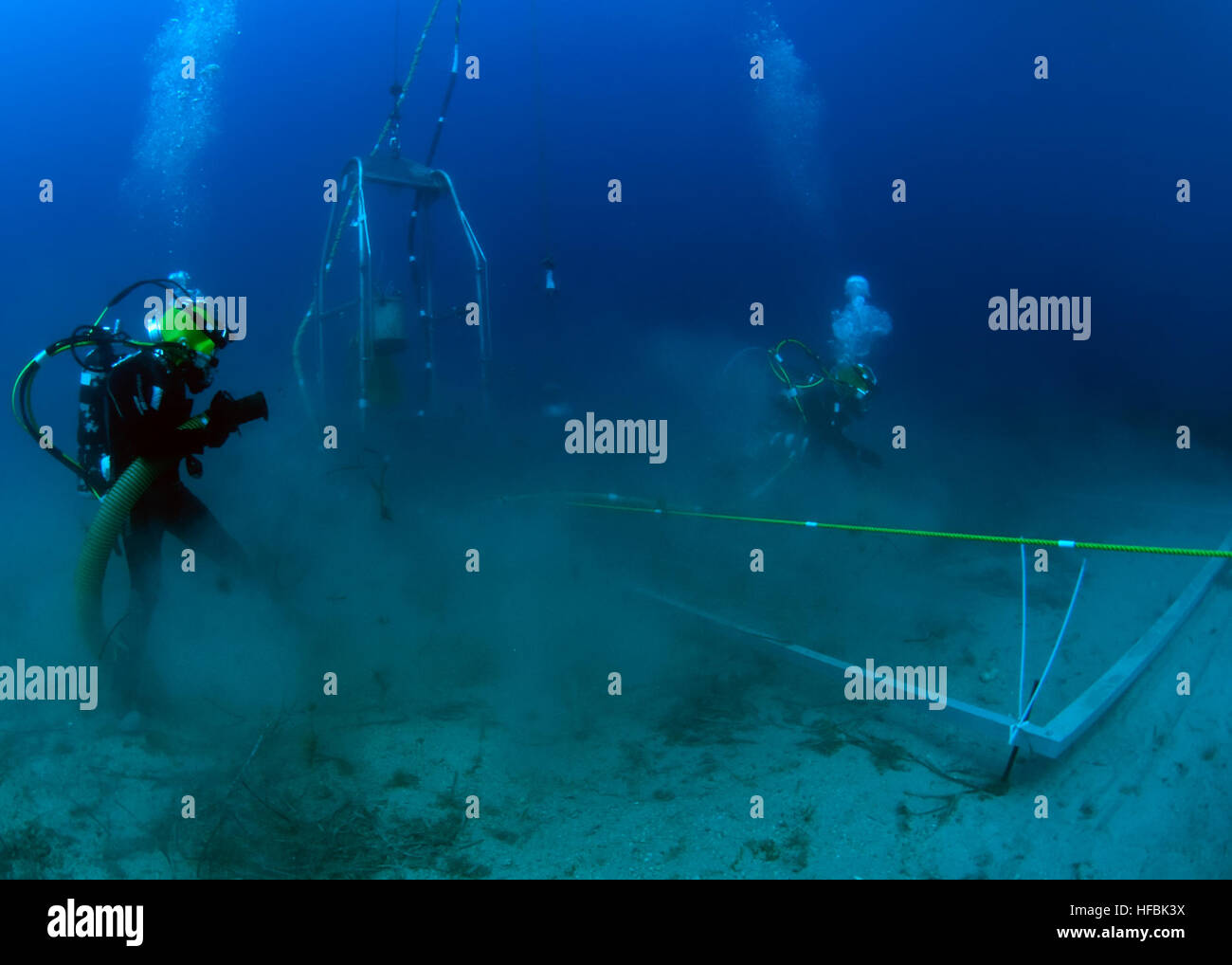 Navy Divers from Mobile Diving and Salvage Unit 2, Company 4, operate a ...